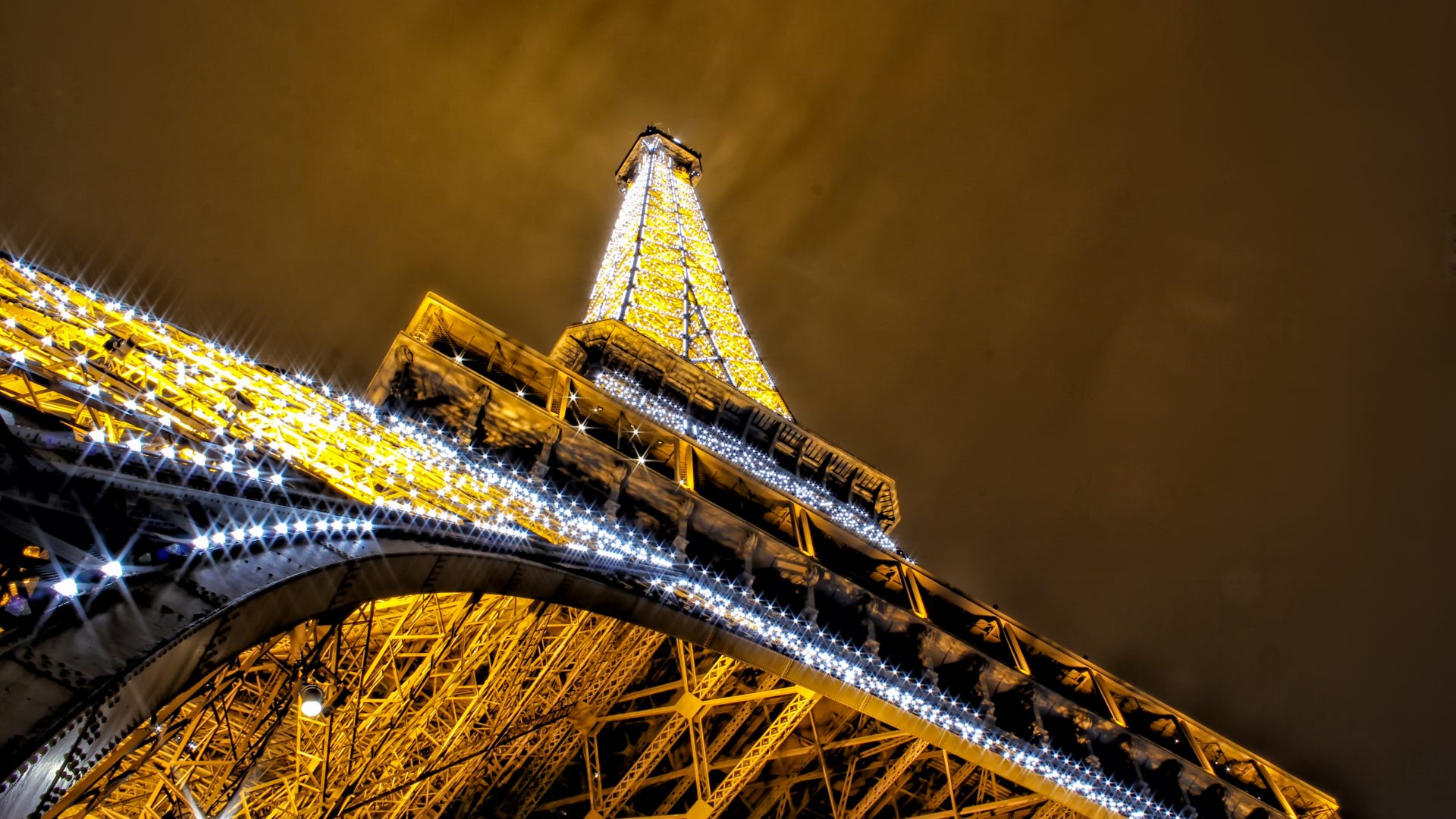 Download mobile wallpaper Paris, Eiffel Tower, Monuments, Light, Man Made for free.