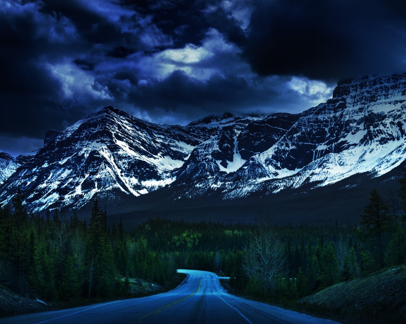 Download mobile wallpaper Sky, Mountain, Dark, Road, Forest, Tree, Cloud, Man Made for free.