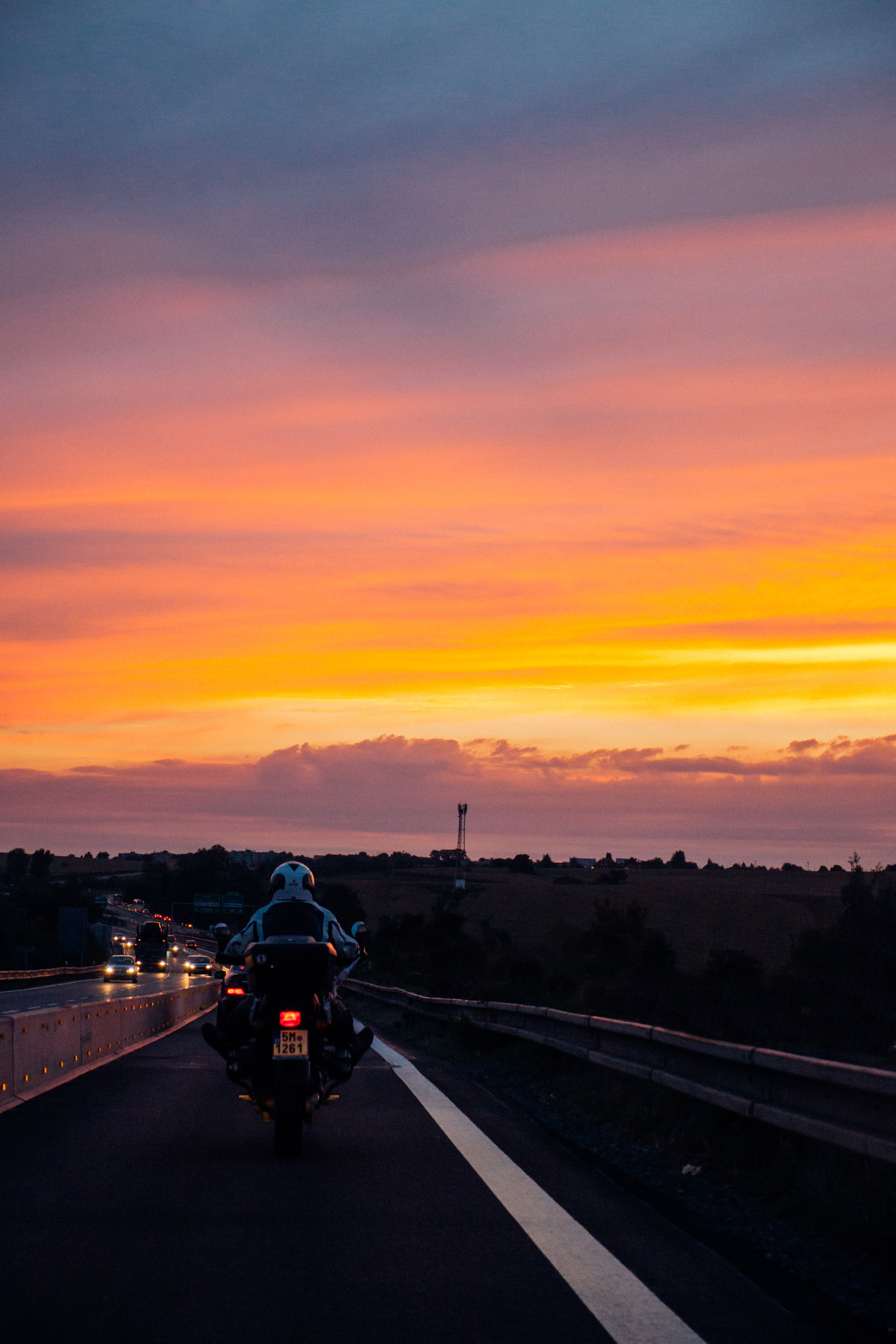 Download mobile wallpaper Sky, Clouds, Road, Markup, Nature, Sunset, Motorcyclist for free.