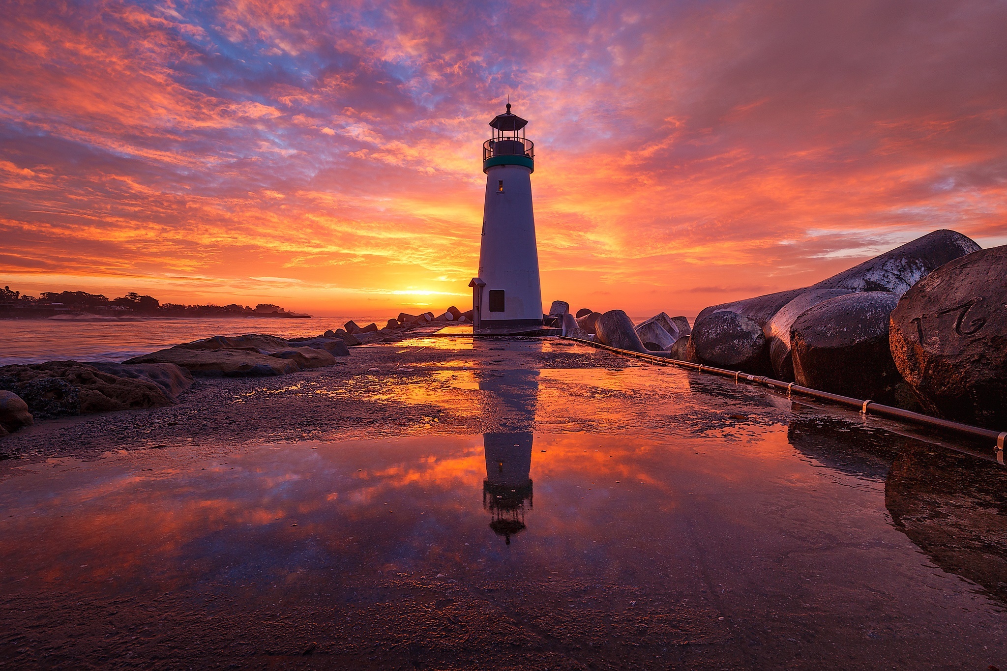 Download mobile wallpaper Sky, Building, Reflection, Sunrise, Lighthouse, Man Made for free.