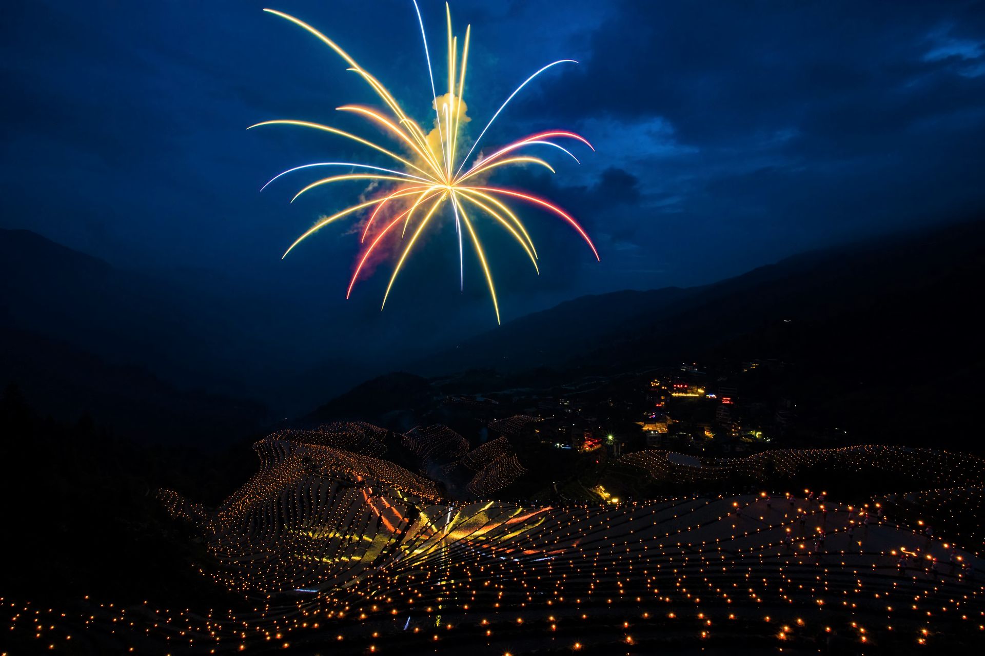 Download mobile wallpaper Landscape, Night, Mountain, Village, Colorful, Fireworks, Photography for free.