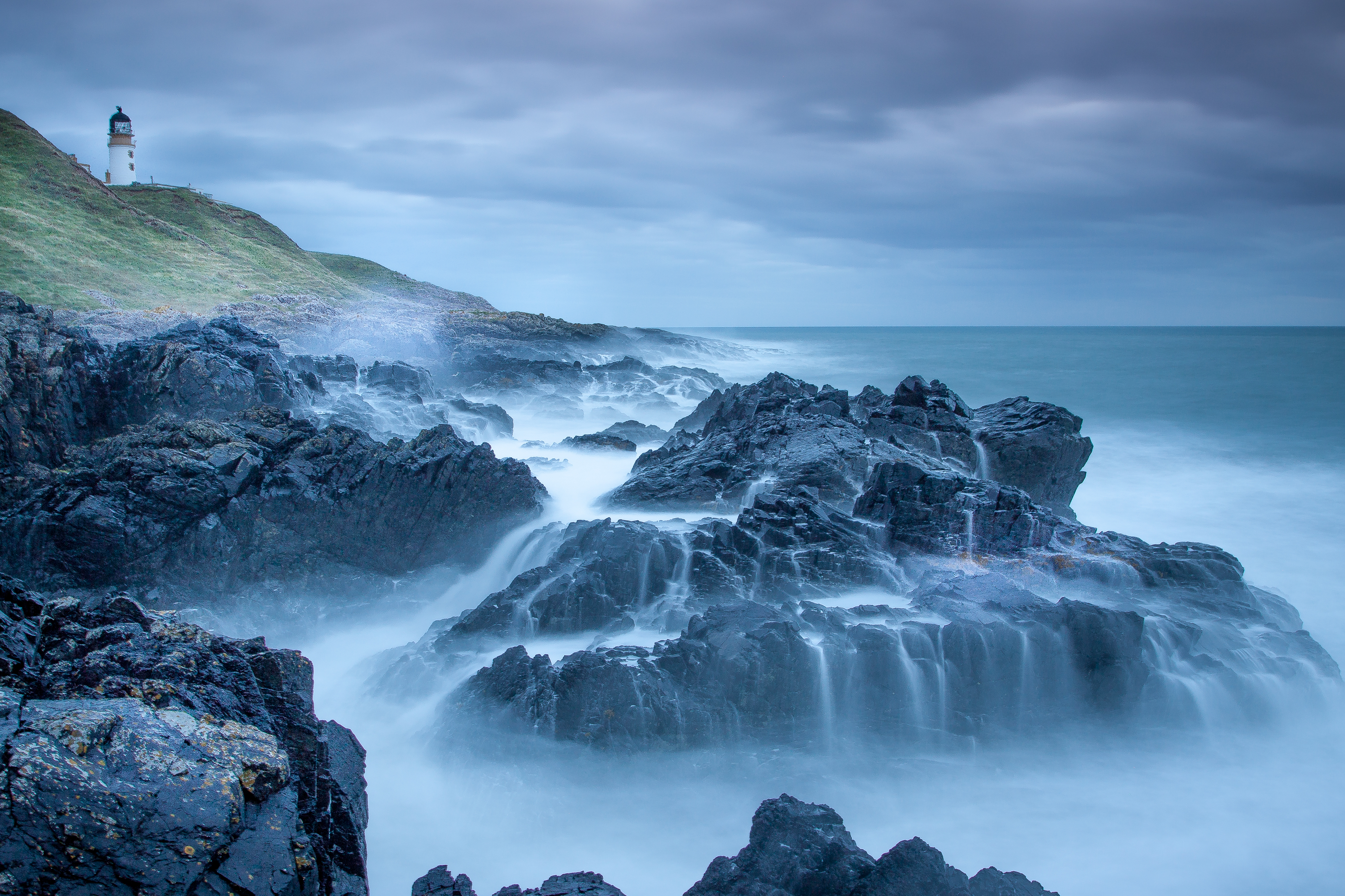 Download mobile wallpaper Horizon, Coast, Ocean, Lighthouse, Coastline, Photography for free.