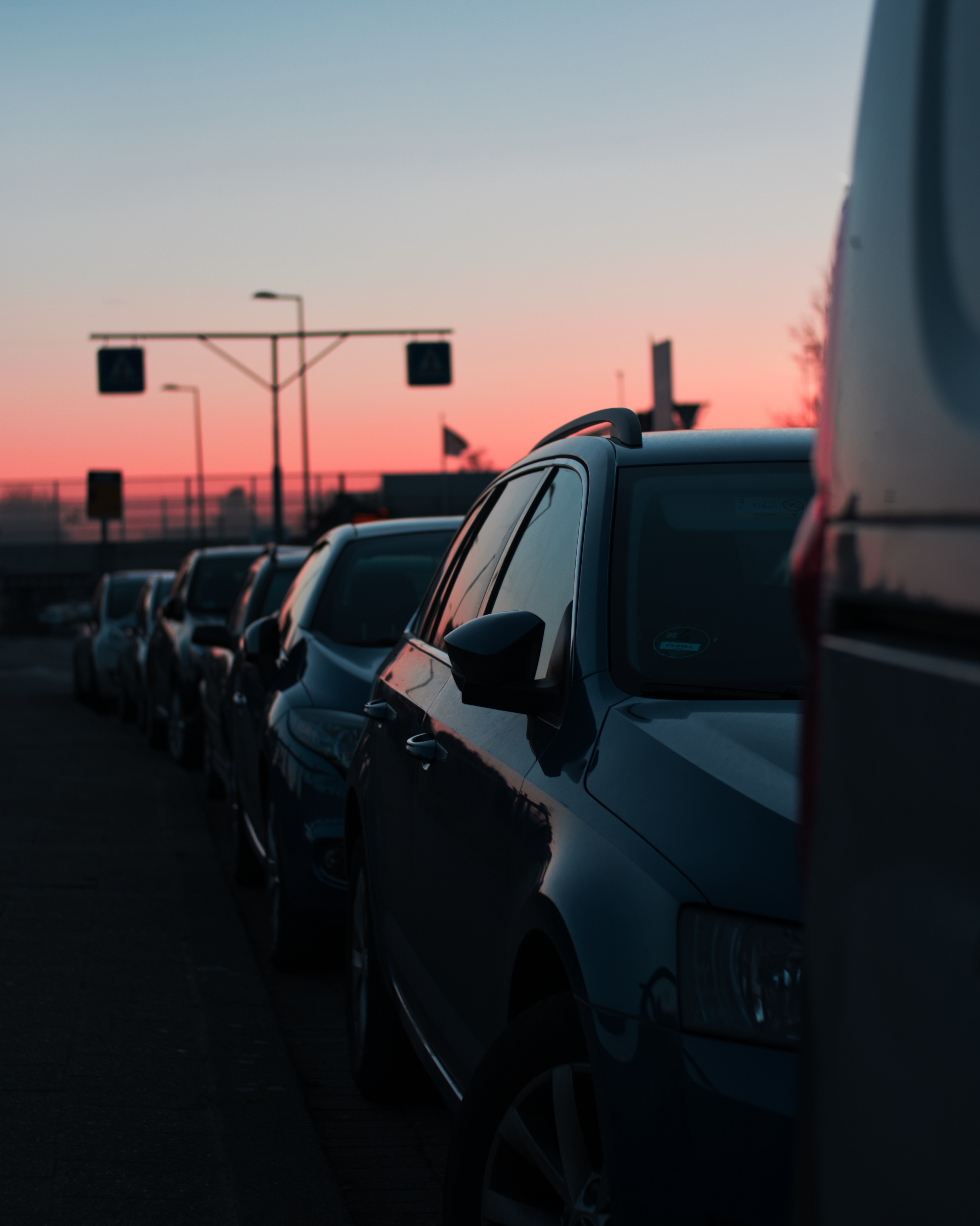 Download mobile wallpaper Traffic, Sky, Sunset, Cars for free.