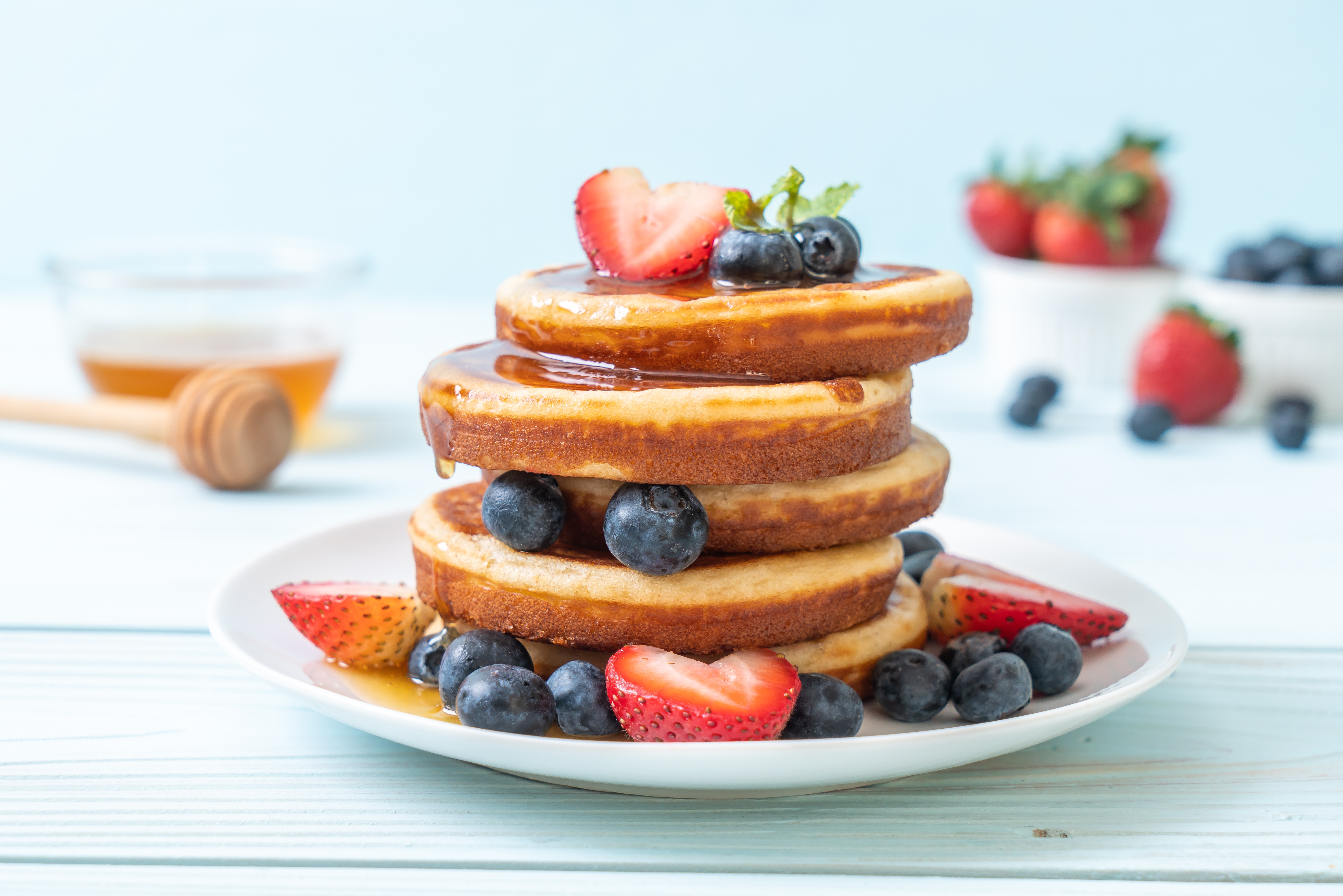 Download mobile wallpaper Food, Strawberry, Blueberry, Still Life, Berry, Fruit, Honey, Breakfast, Pancake for free.