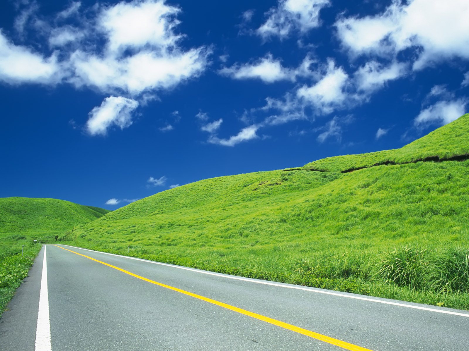 Download mobile wallpaper Sky, Road, Hill, Man Made for free.