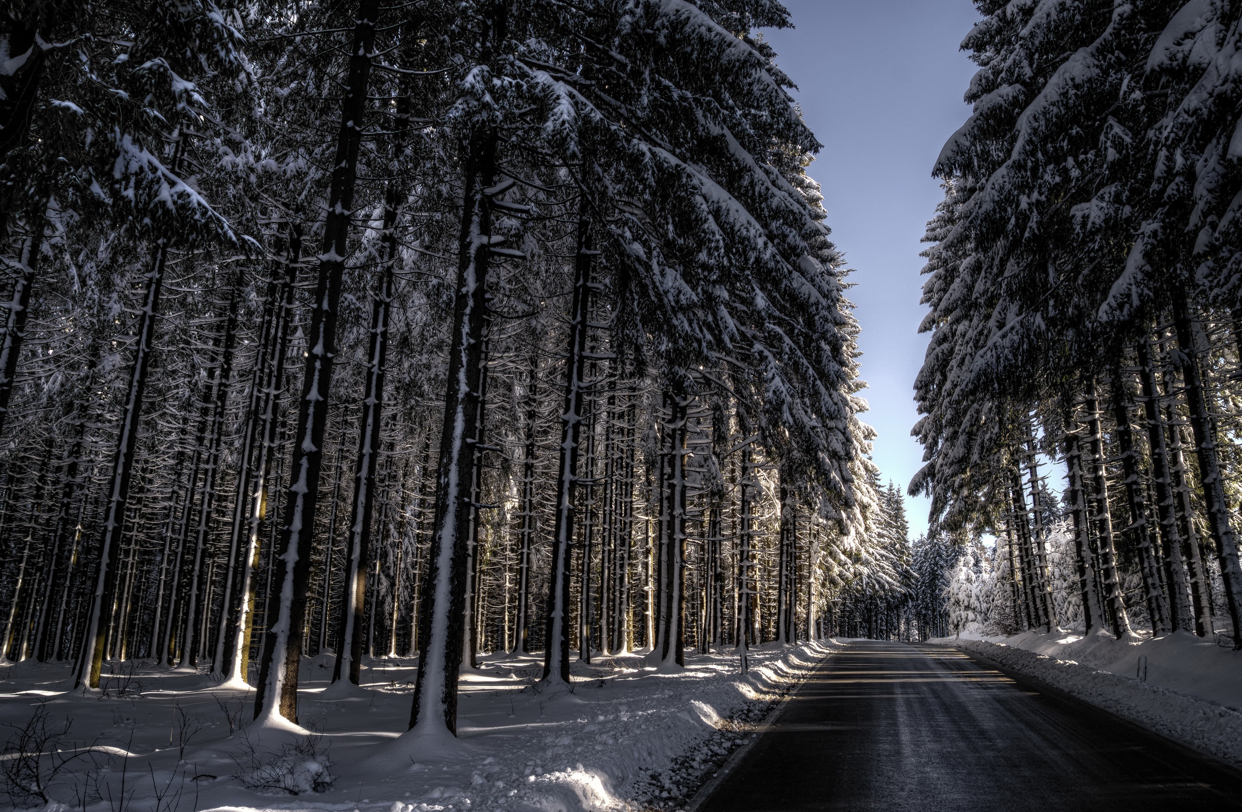 Free download wallpaper Winter, Nature, Snow, Road, Forest, Tree, Man Made on your PC desktop