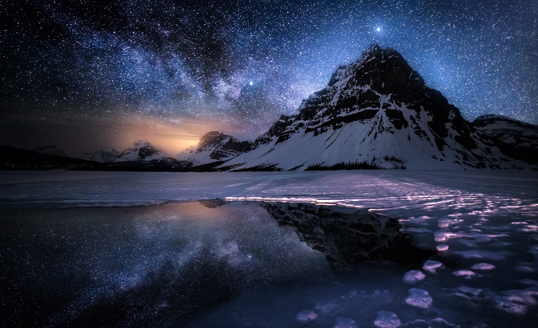 Download mobile wallpaper Winter, Sky, Ice, Stars, Snow, Mountain, Lake, Starry Sky, Earth, Milky Way for free.