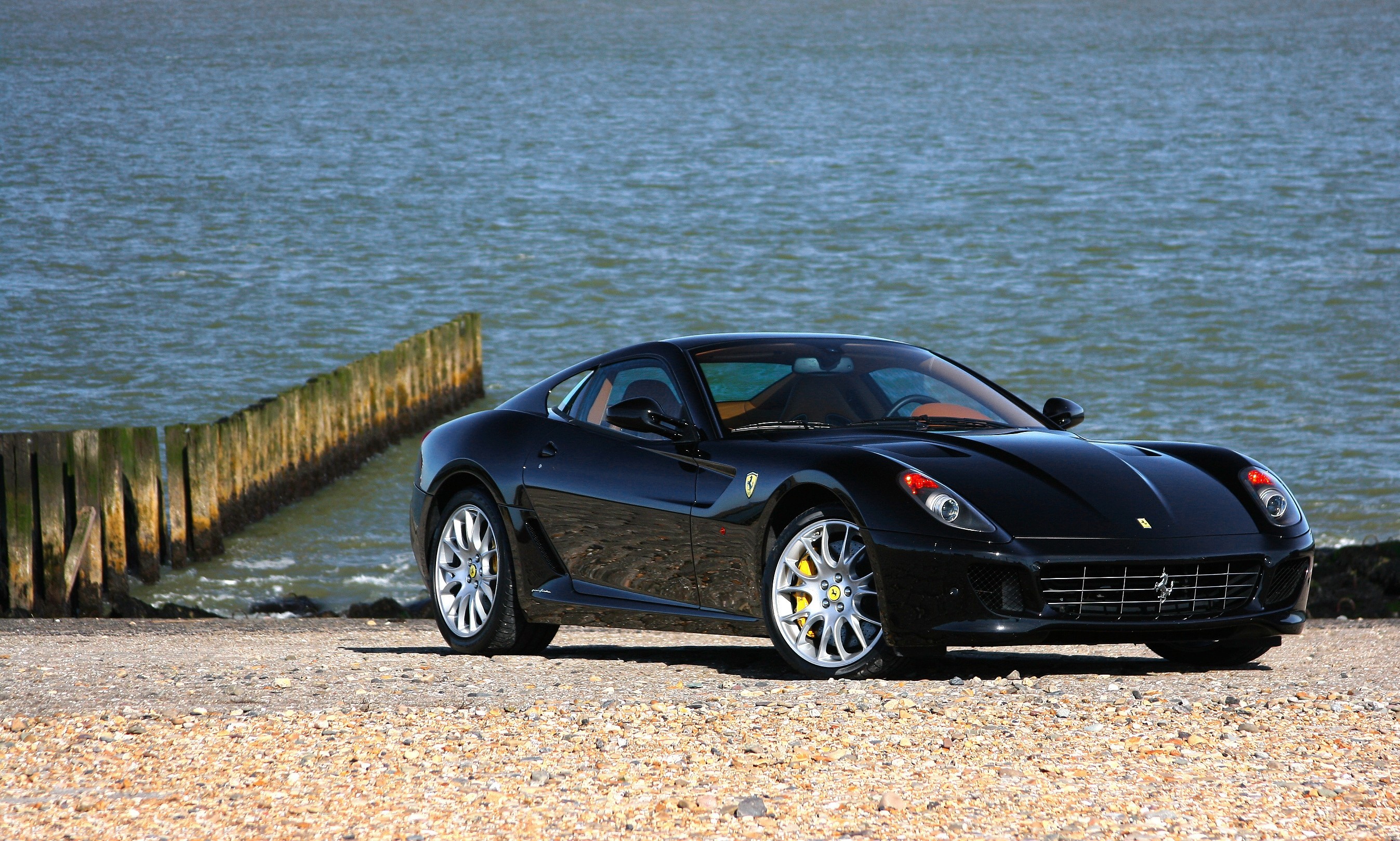 Download mobile wallpaper Shore, Bank, Cars, Front View, Ferrari for free.