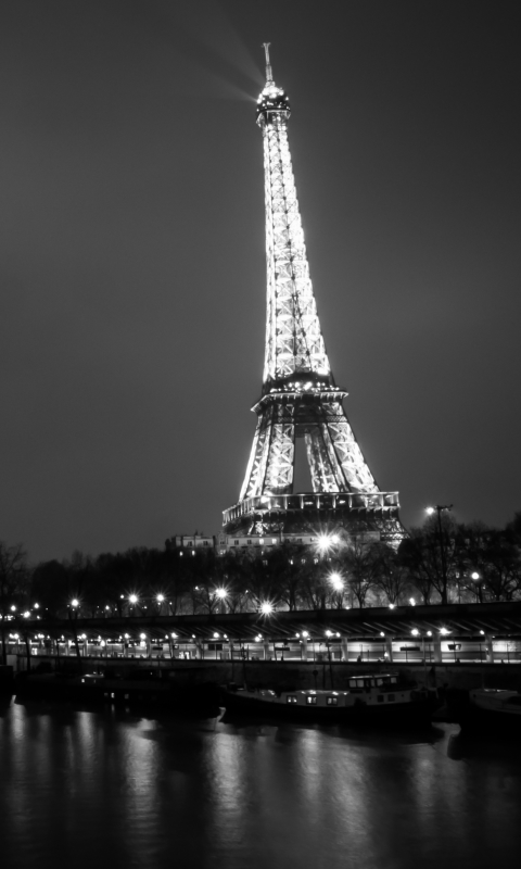 Download mobile wallpaper Cities, Night, Paris, Eiffel Tower, Light, France, River, Man Made, Black & White for free.