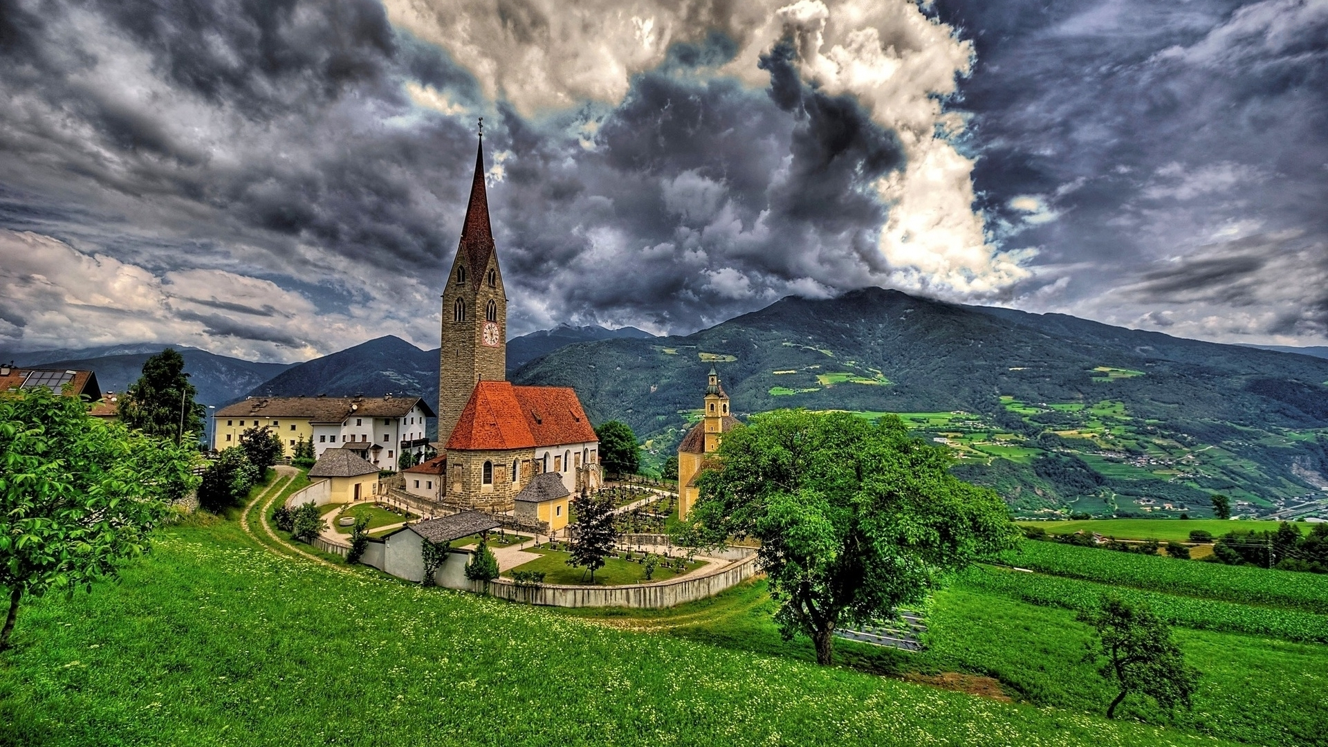 Download mobile wallpaper Landscape, Architecture, Italy, Mountain, House, Village, Cloud, Church, Man Made for free.