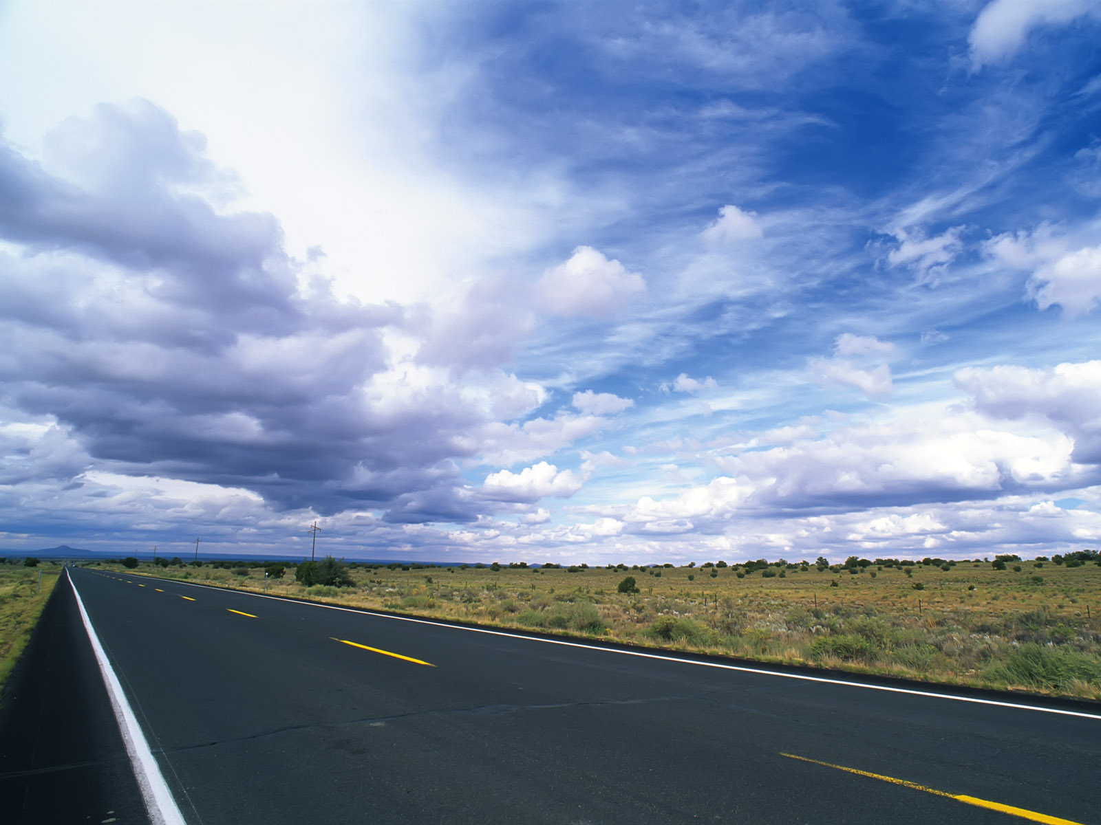 Download mobile wallpaper Sky, Road, Field, Man Made for free.