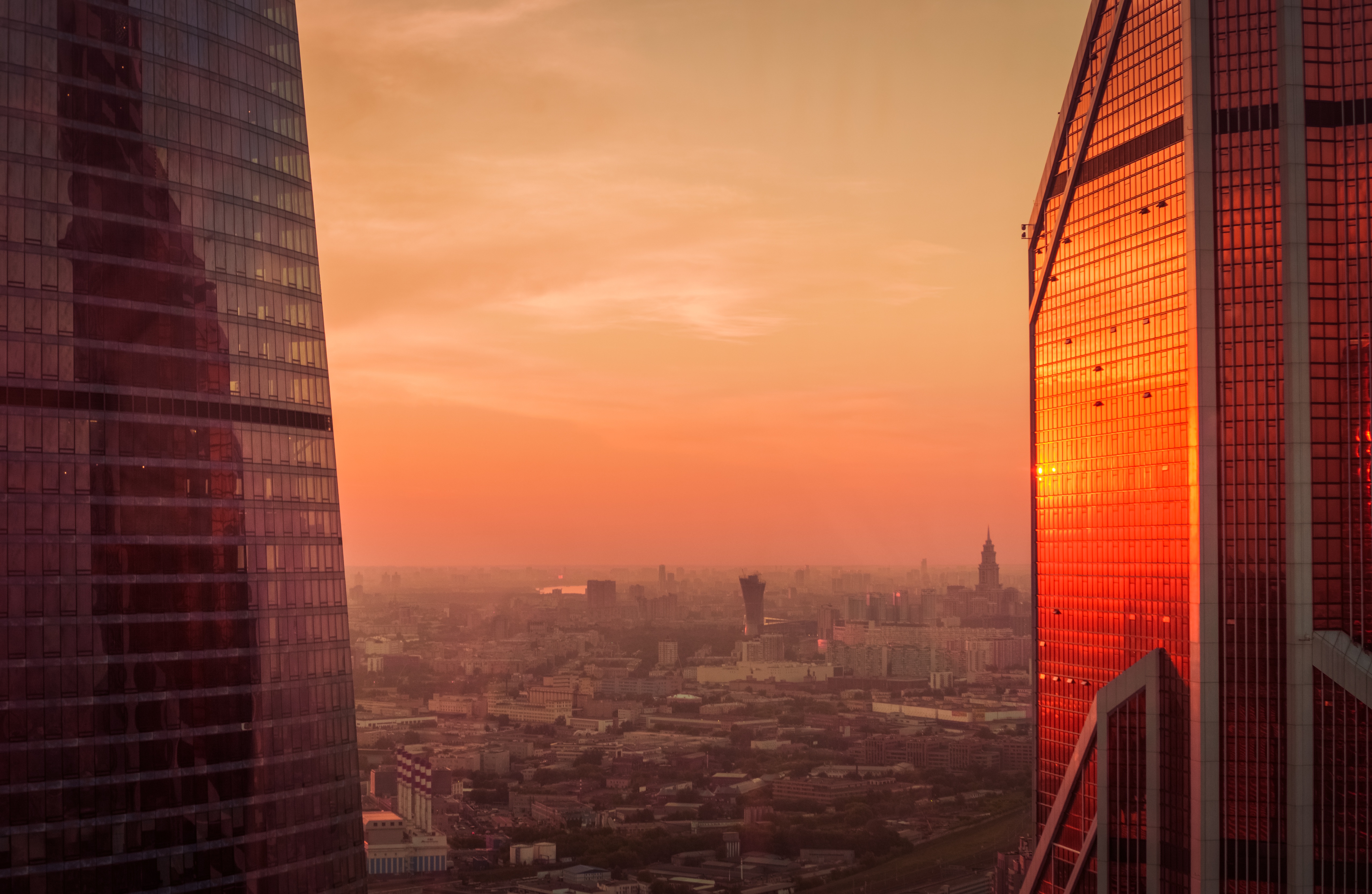 Download mobile wallpaper Cities, Sunset, Building, Horizon, Cityscape, Russia, Moscow, Man Made for free.
