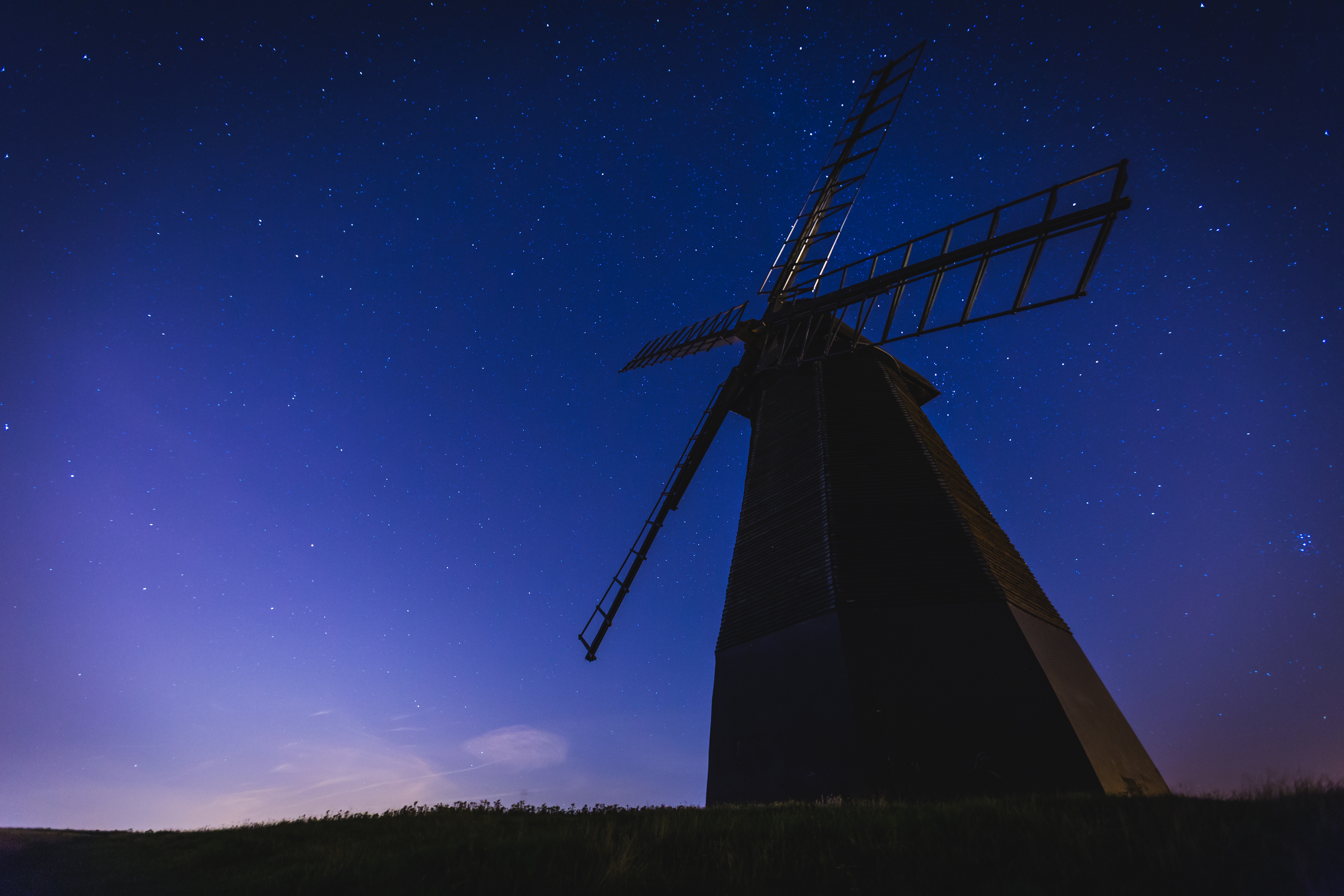 Download mobile wallpaper Sky, Stars, Night, Windmill, Man Made for free.