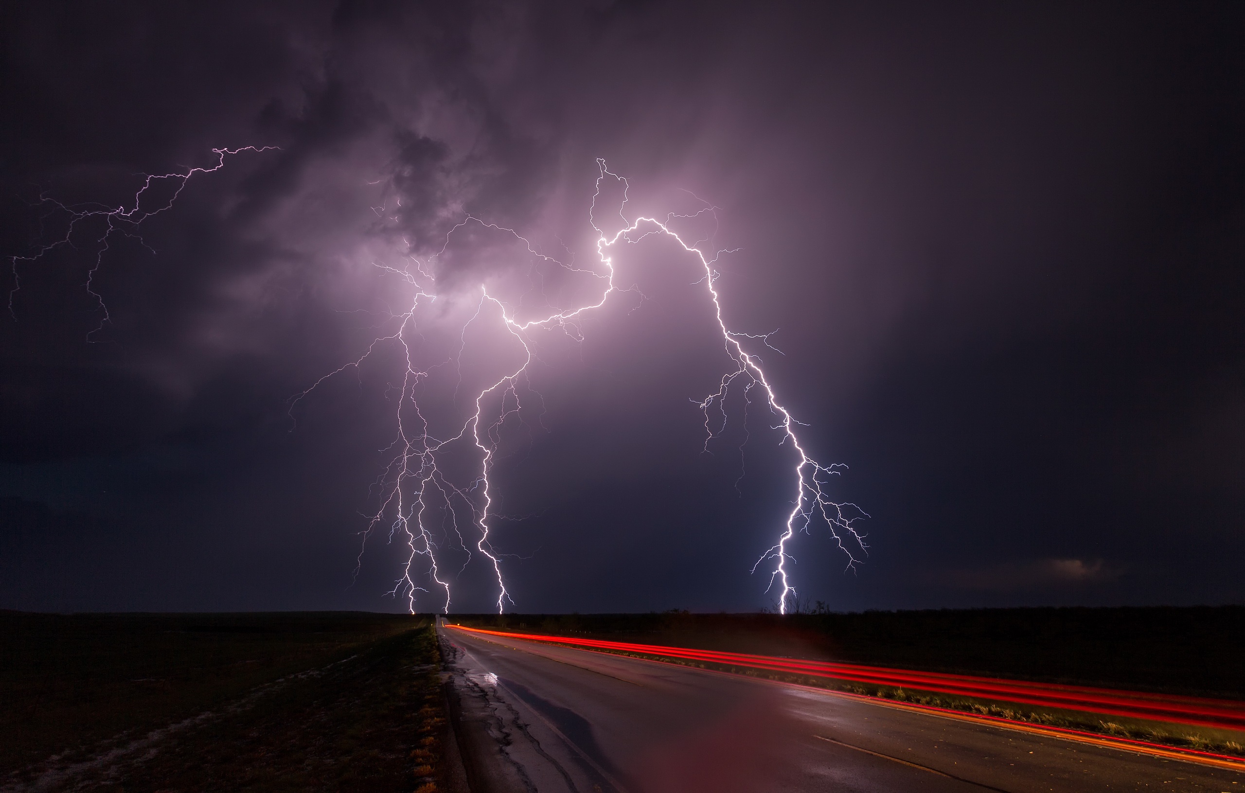 Download mobile wallpaper Landscape, Sky, Night, Lightning, Road, Photography, Time Lapse for free.