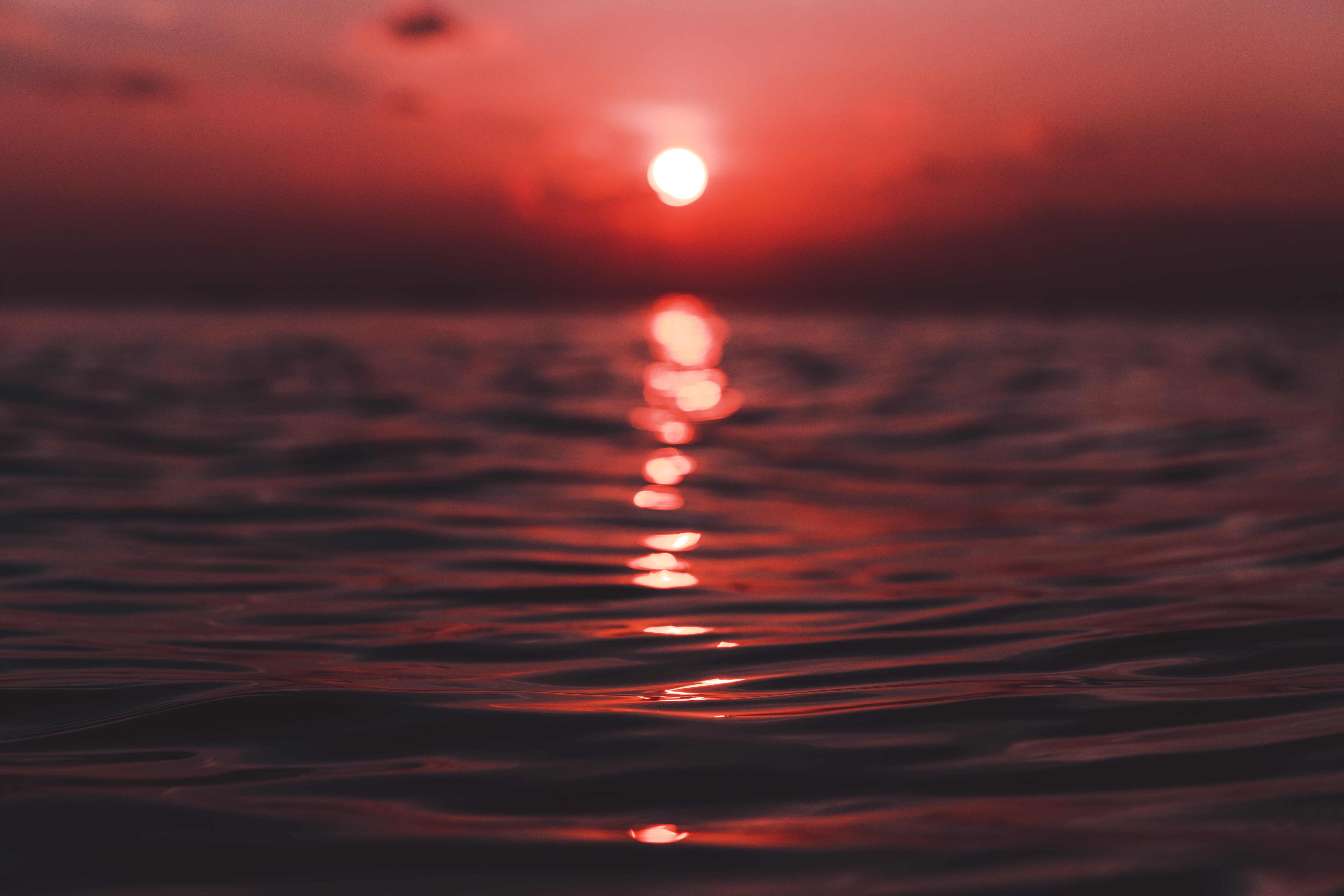 Download mobile wallpaper Reflection, Waves, Nature, Sunset for free.