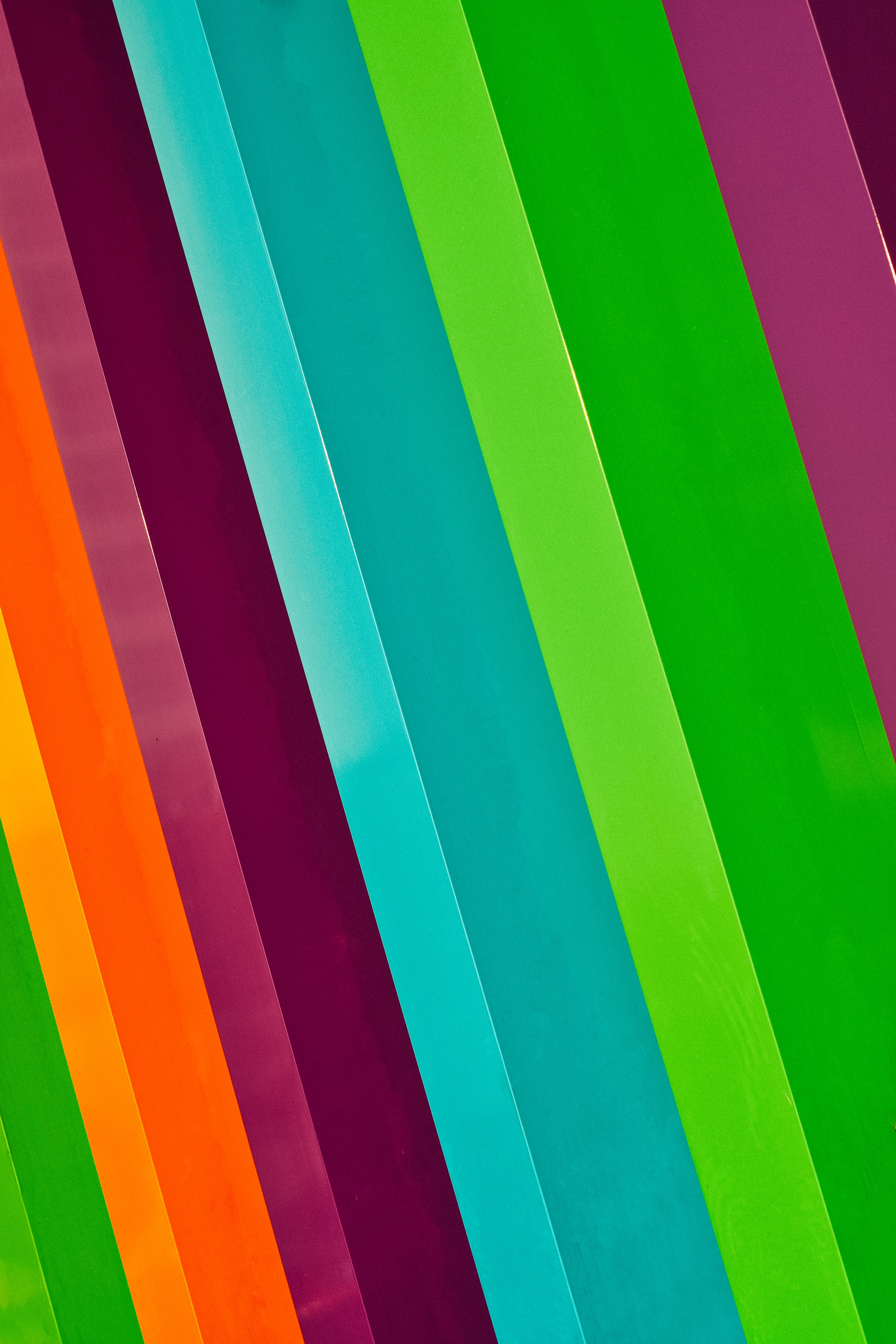 Download mobile wallpaper Diagonal, Motley, Bright, Multicolored, Streaks, Stripes, Lines, Abstract for free.