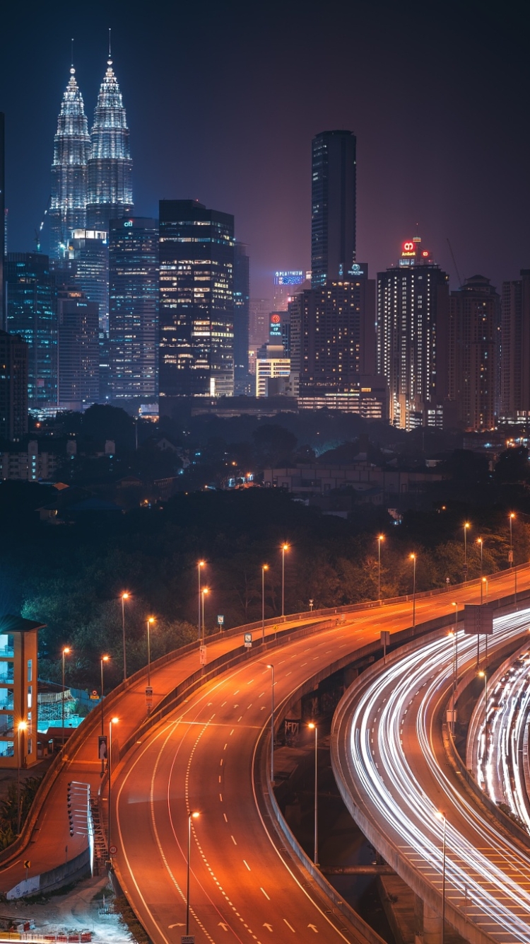 Download mobile wallpaper Cities, Night, City, Skyscraper, Building, Light, Cityscape, Kuala Lumpur, Malaysia, Highway, Man Made, Time Lapse for free.