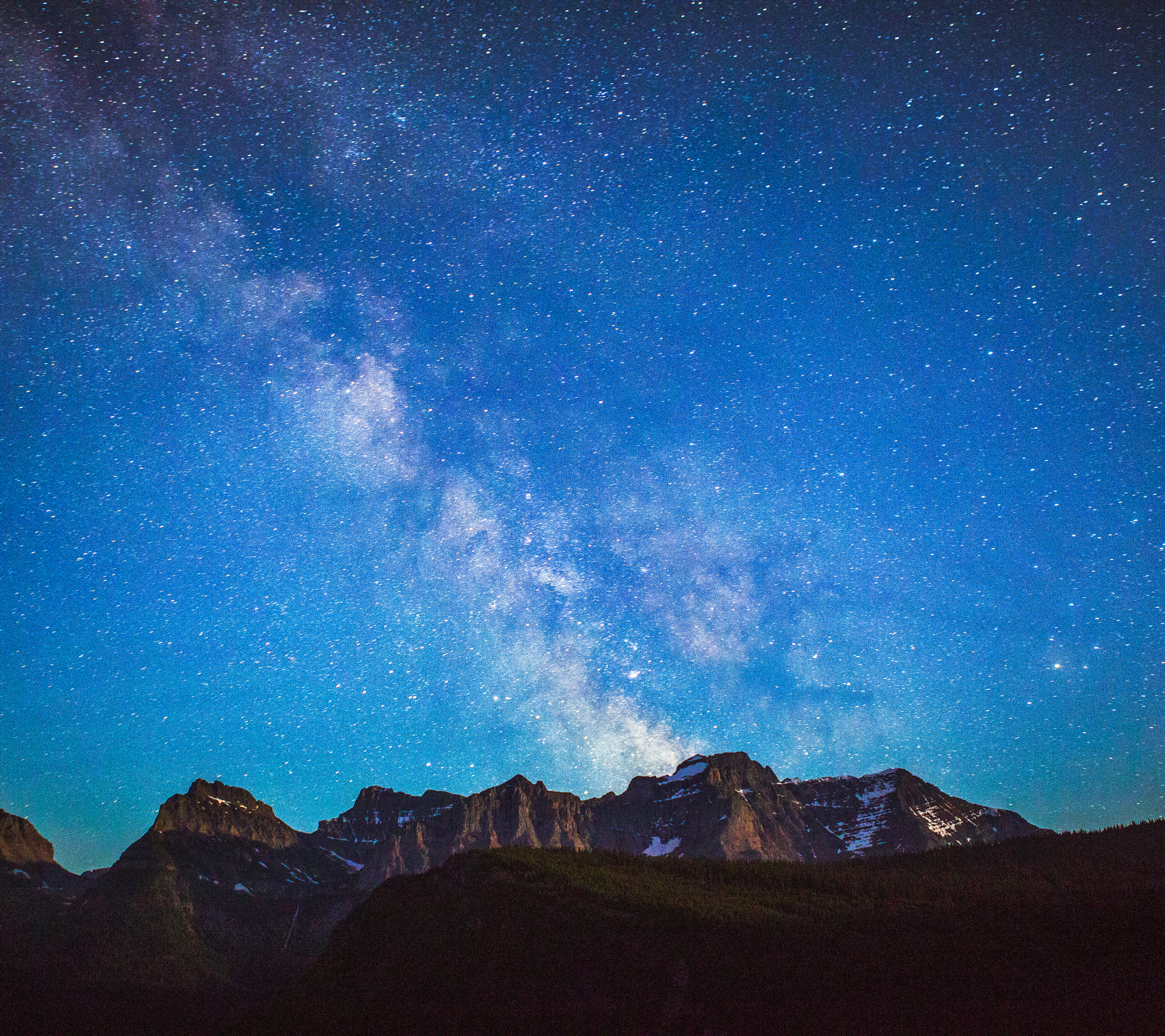 Download mobile wallpaper Nature, Sky, Stars, Night, Mountain, Starry Sky, Earth, Milky Way, National Park, Montana, Glacier National Park for free.