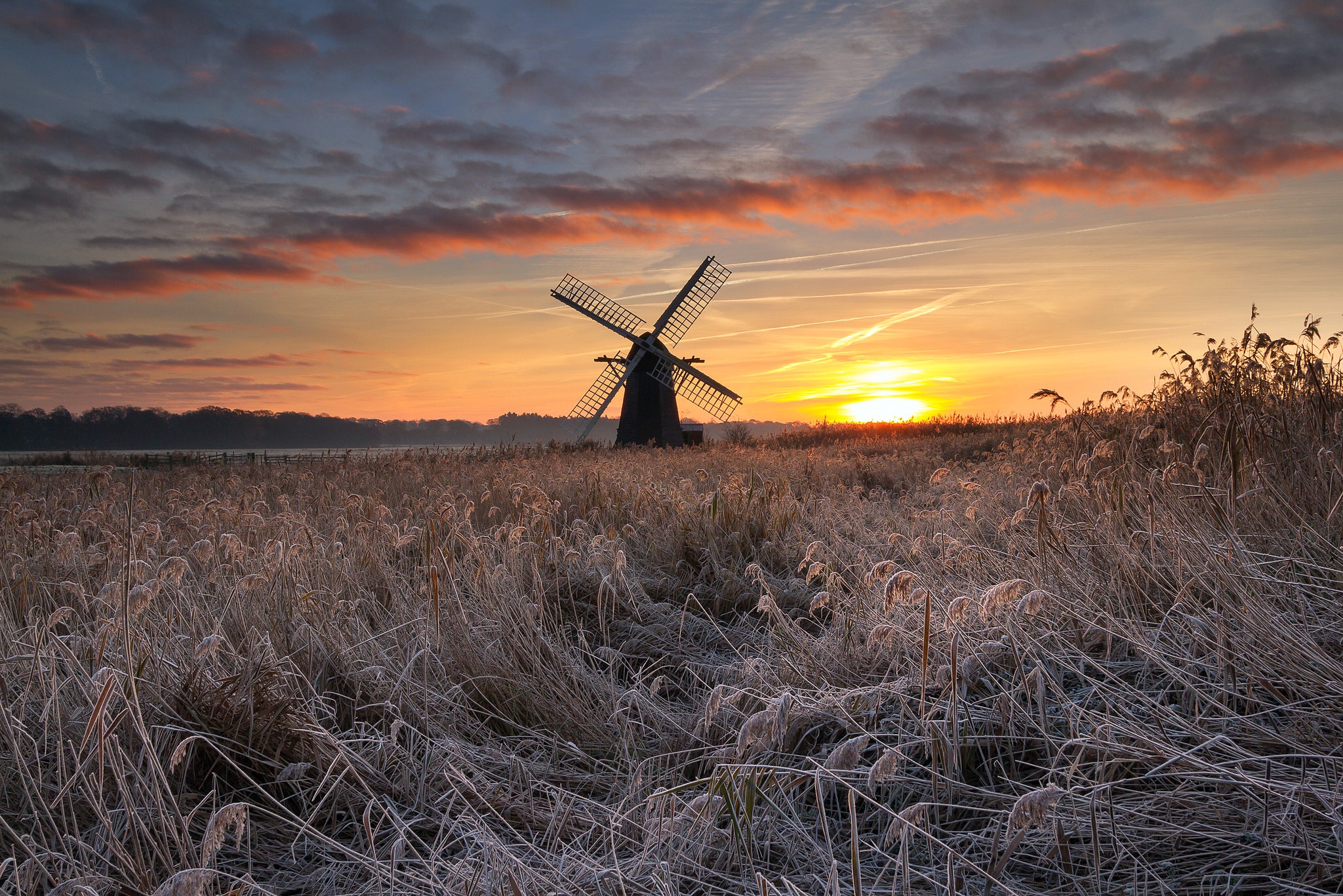 Download mobile wallpaper Grass, Sky, Building, Sunrise, Frost, Windmill, Man Made for free.