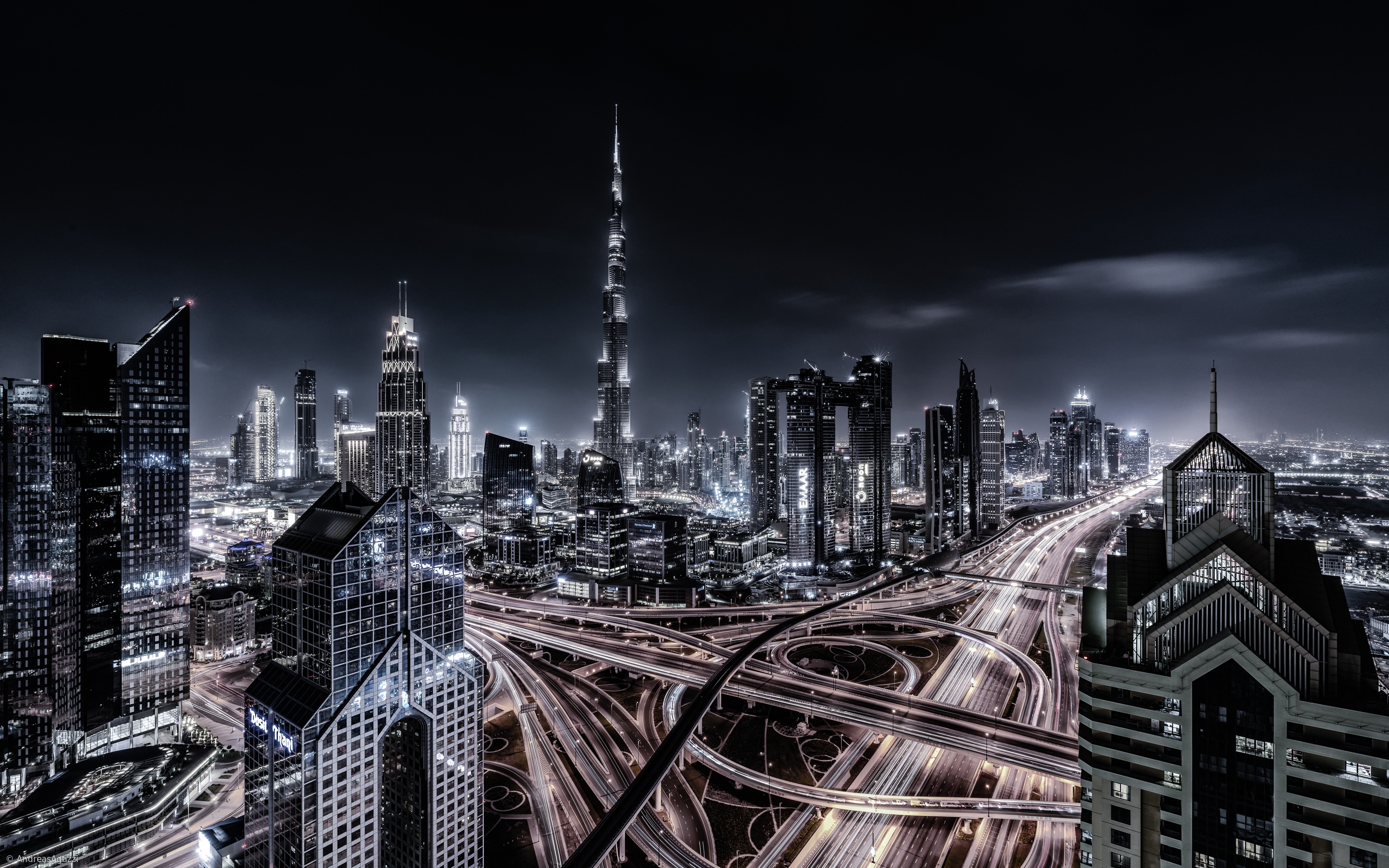 Download mobile wallpaper Cities, Night, City, Skyscraper, Building, Dubai, Cityscape, United Arab Emirates, Highway, Man Made for free.
