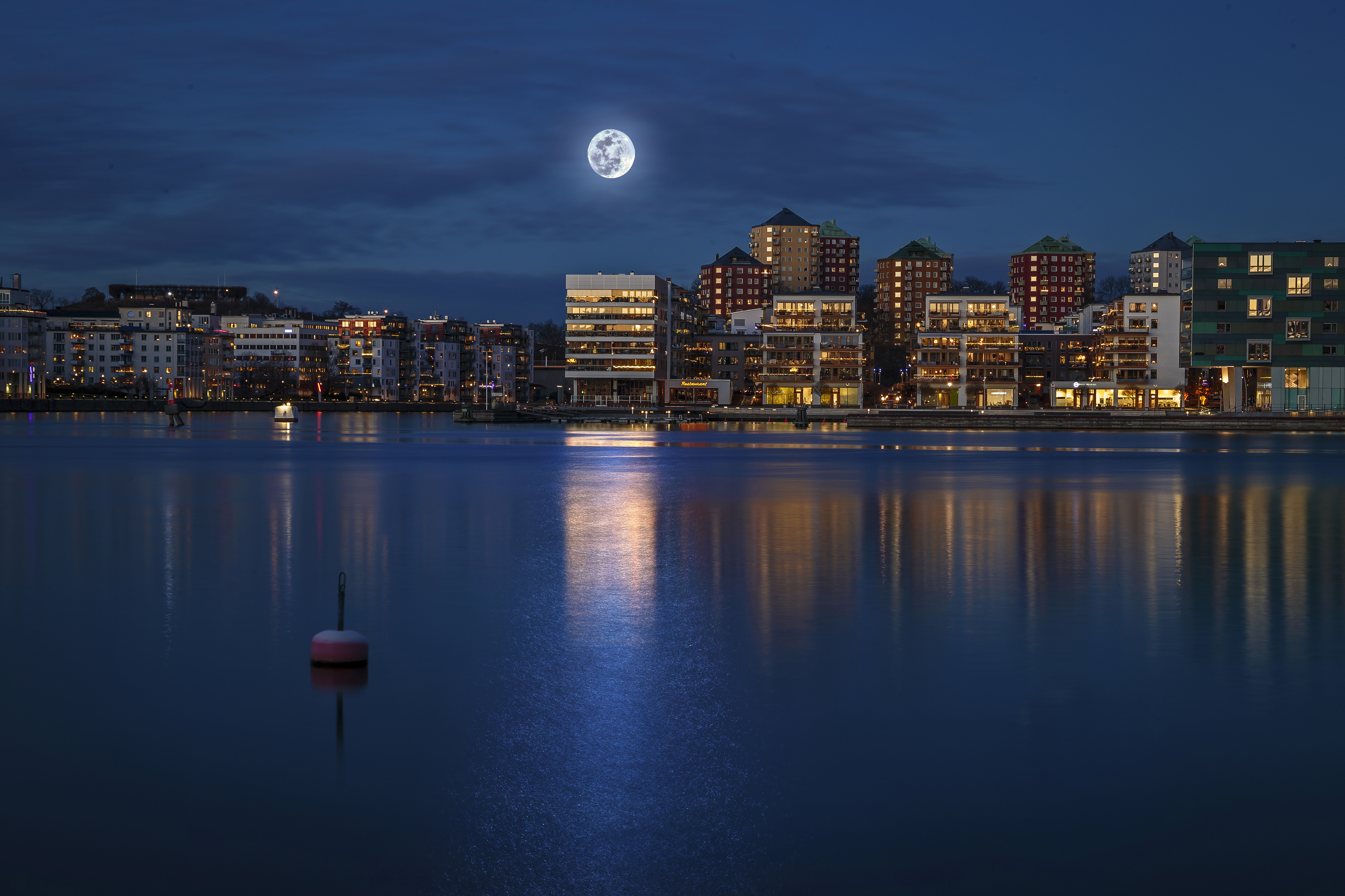 Free download wallpaper Cities, Night, Moon, City, Building, Stockholm, Sweden, Man Made on your PC desktop