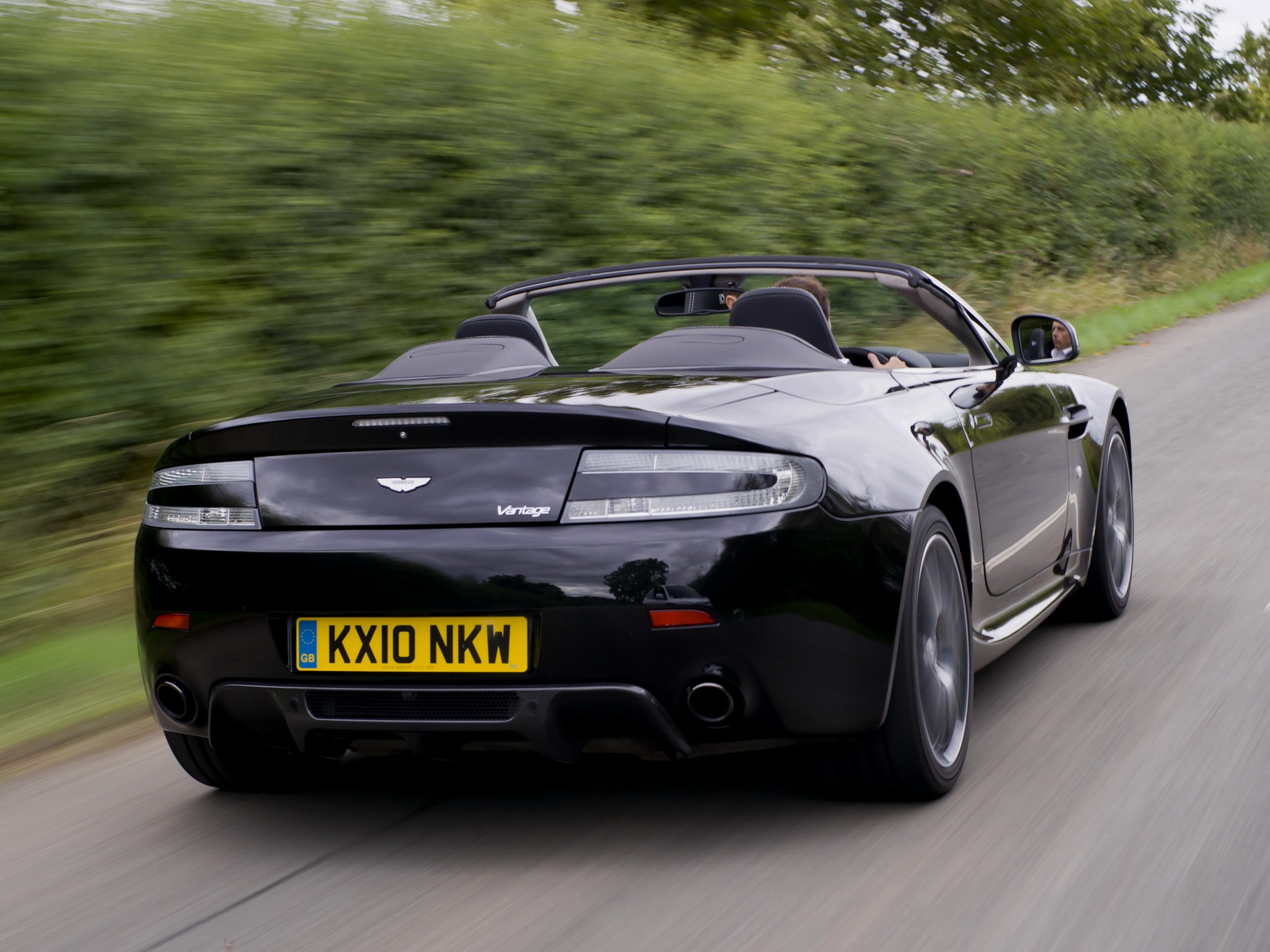 cars, auto, aston martin, black, back view, rear view, speed, 2010, v8, vantage High Definition image