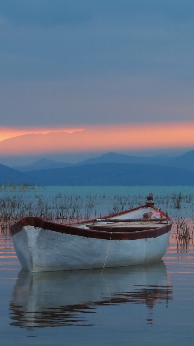 Download mobile wallpaper Landscape, Sunset, Mountain, Lake, Boat, Scenic, Vehicles for free.