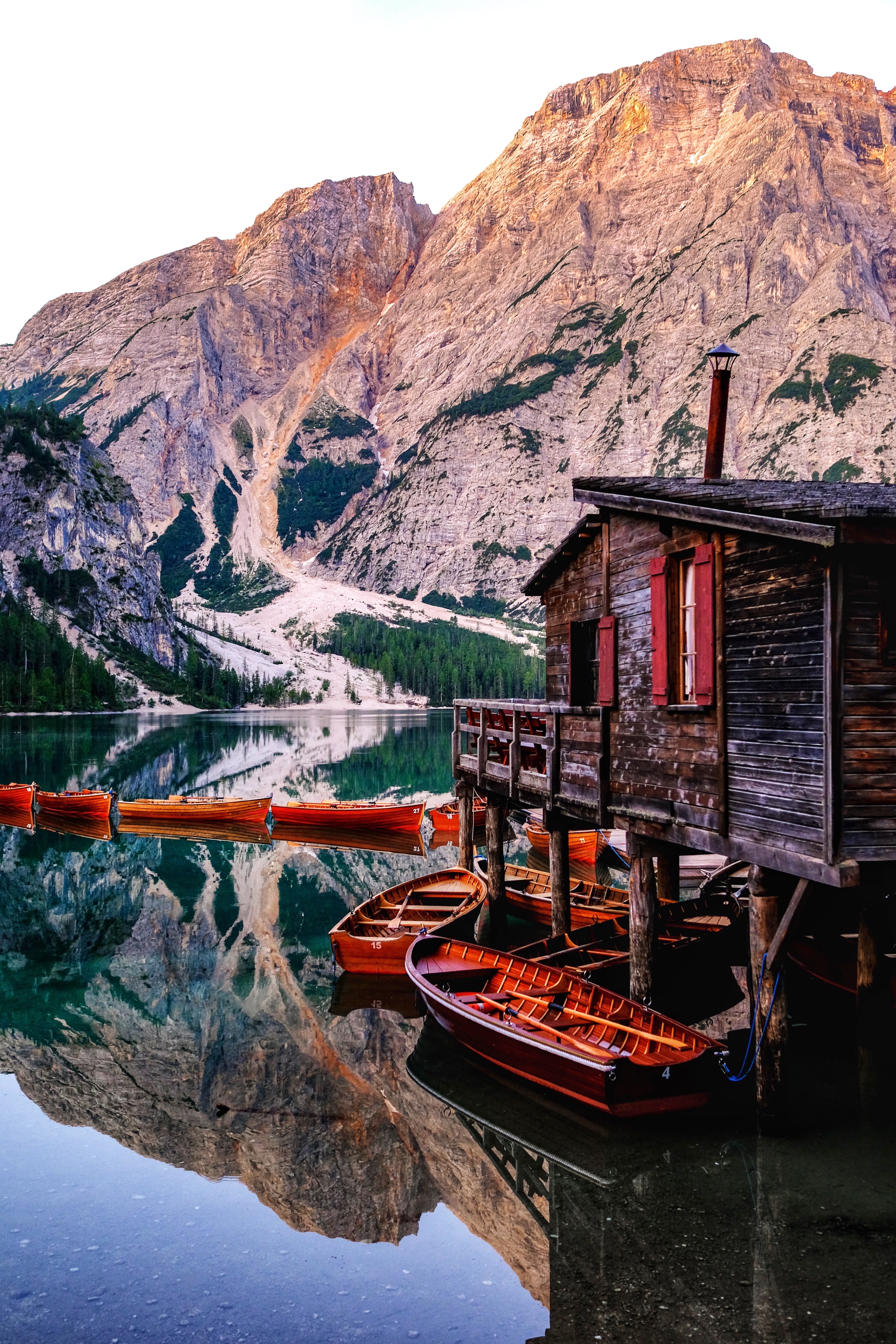 Free download wallpaper Nature, Building, Lake, Mountains, Boats, Pier on your PC desktop
