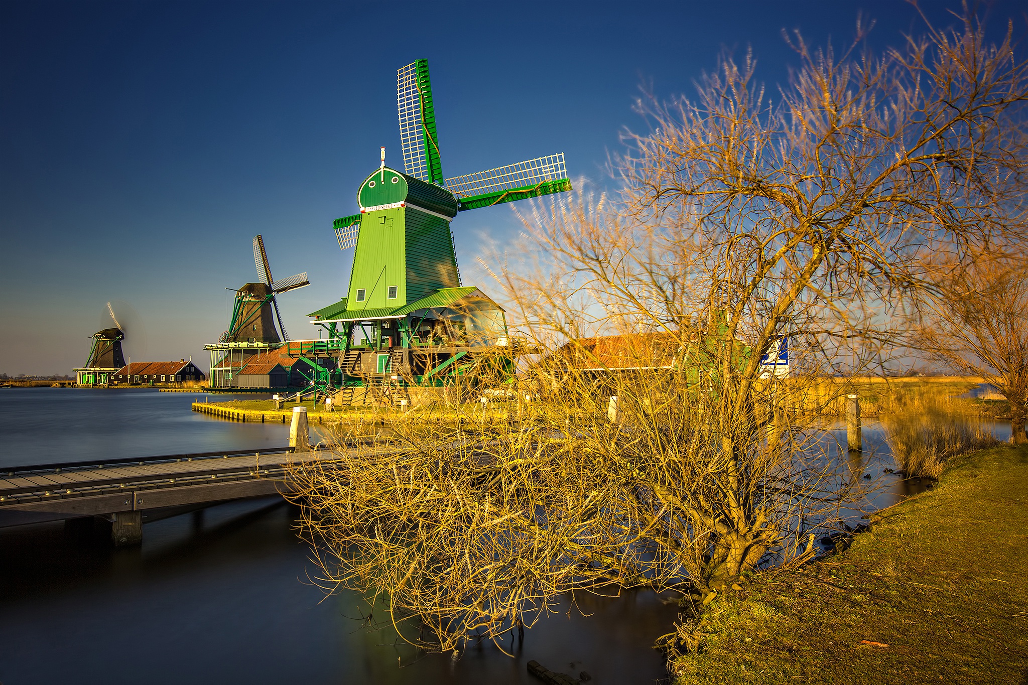 Download mobile wallpaper Netherlands, Windmill, Man Made, Canal for free.