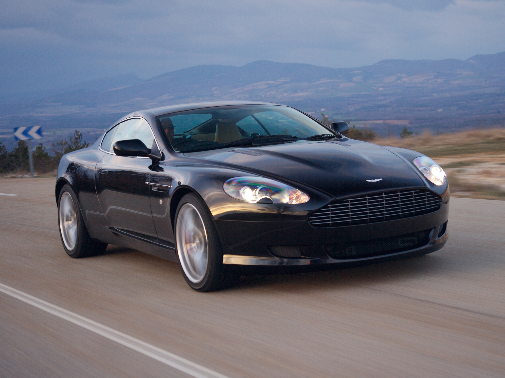 Free download wallpaper Auto, Nature, Asphalt, Front View, Speed, Style, Db9, 2006, Sports, Mountains, Aston Martin, Cars on your PC desktop