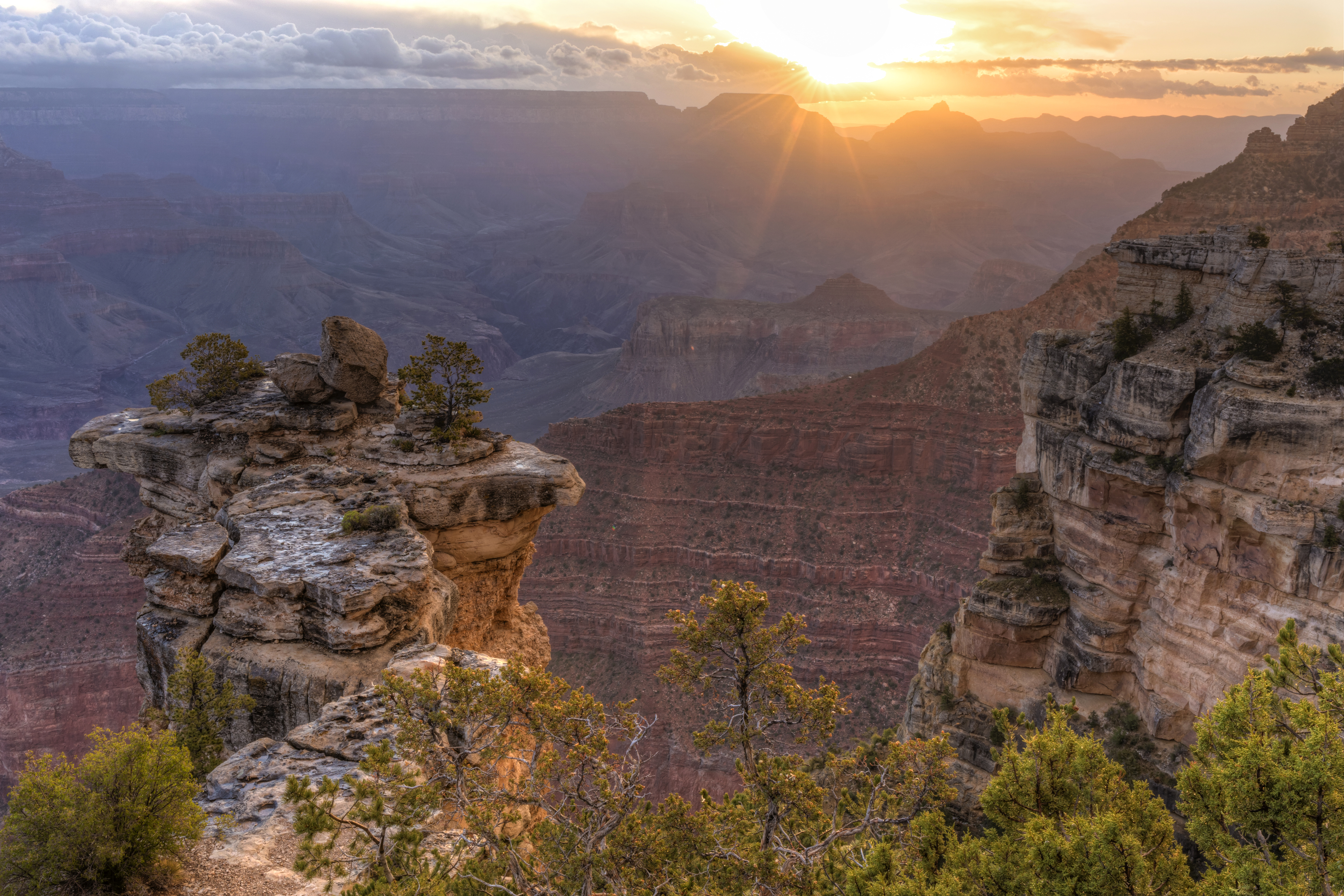 Download mobile wallpaper Sun, Canyon, Sunrise, Earth, Canyons, Sunbeam for free.