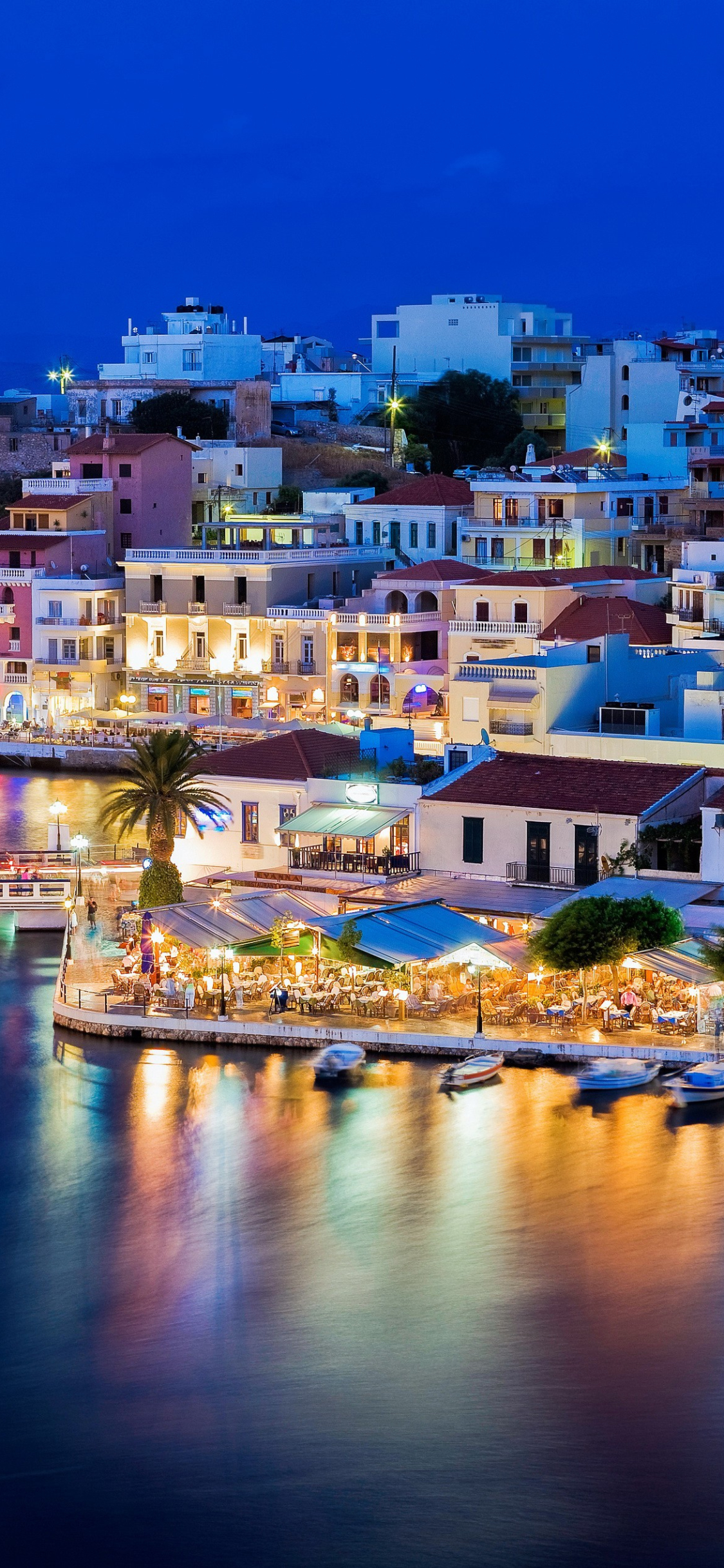 Download mobile wallpaper Night, Light, House, Village, Greece, Crete, Man Made for free.