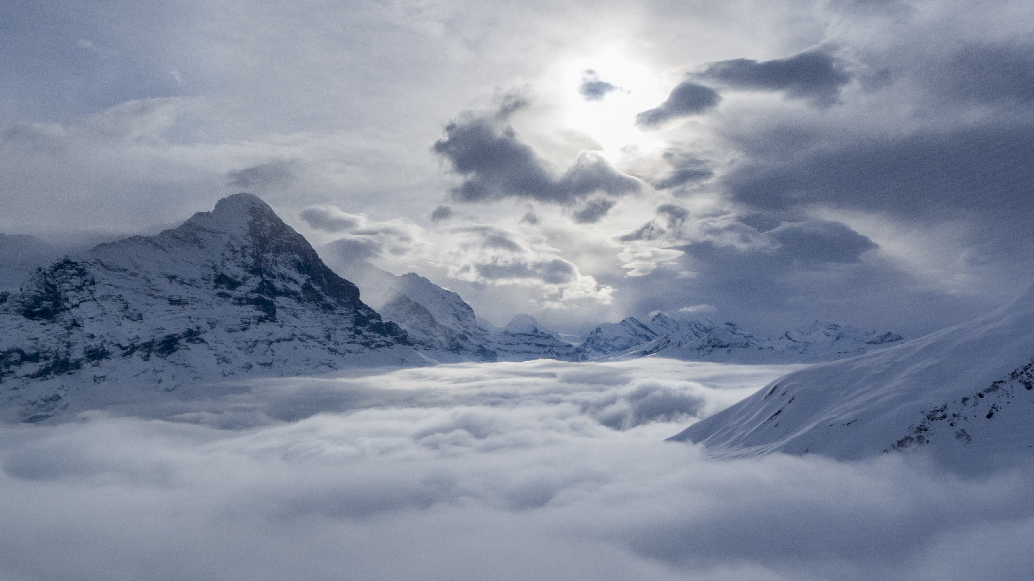 Free download wallpaper Nature, Sky, Mountains, Snow, Mountain, Peak, Fog, Alps, Earth, Switzerland, Cloud, Alps Mountain on your PC desktop