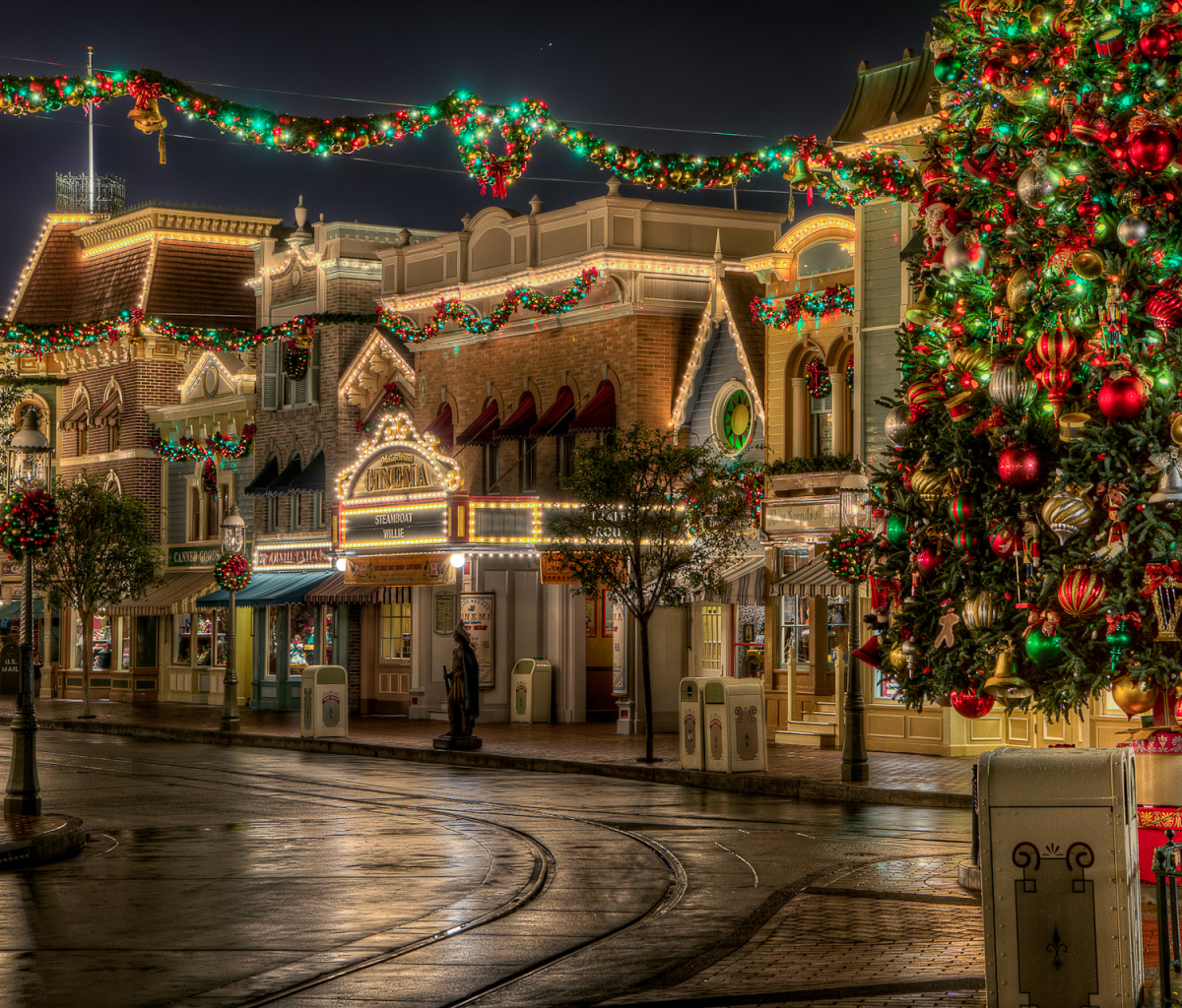 Download mobile wallpaper Disneyland, Building, Christmas, Christmas Tree, Street, Man Made, Christmas Ornaments, Christmas Lights, Disney for free.