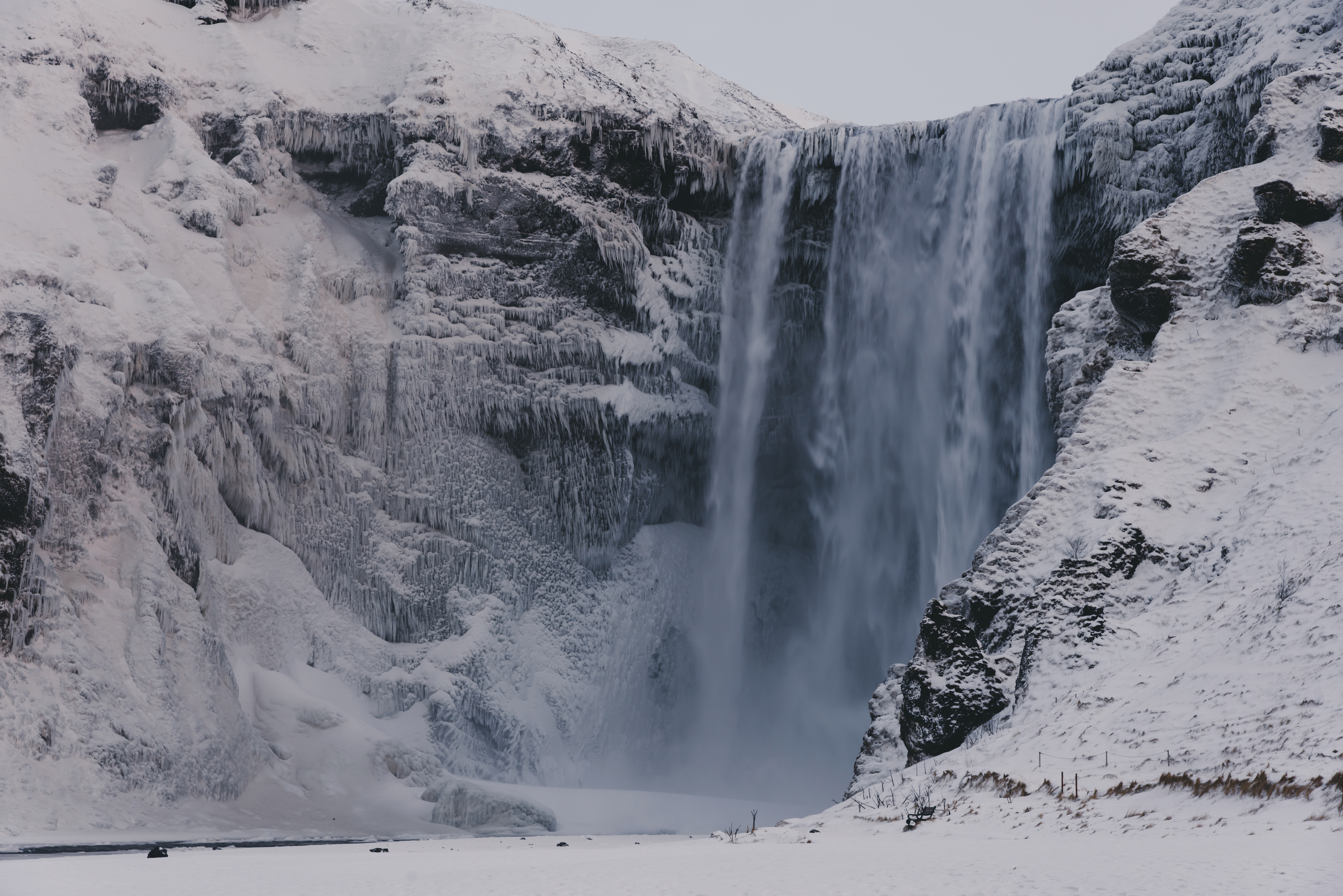 Download mobile wallpaper Winter, Nature, Waterfalls, Snow, Waterfall, Earth, Cliff for free.
