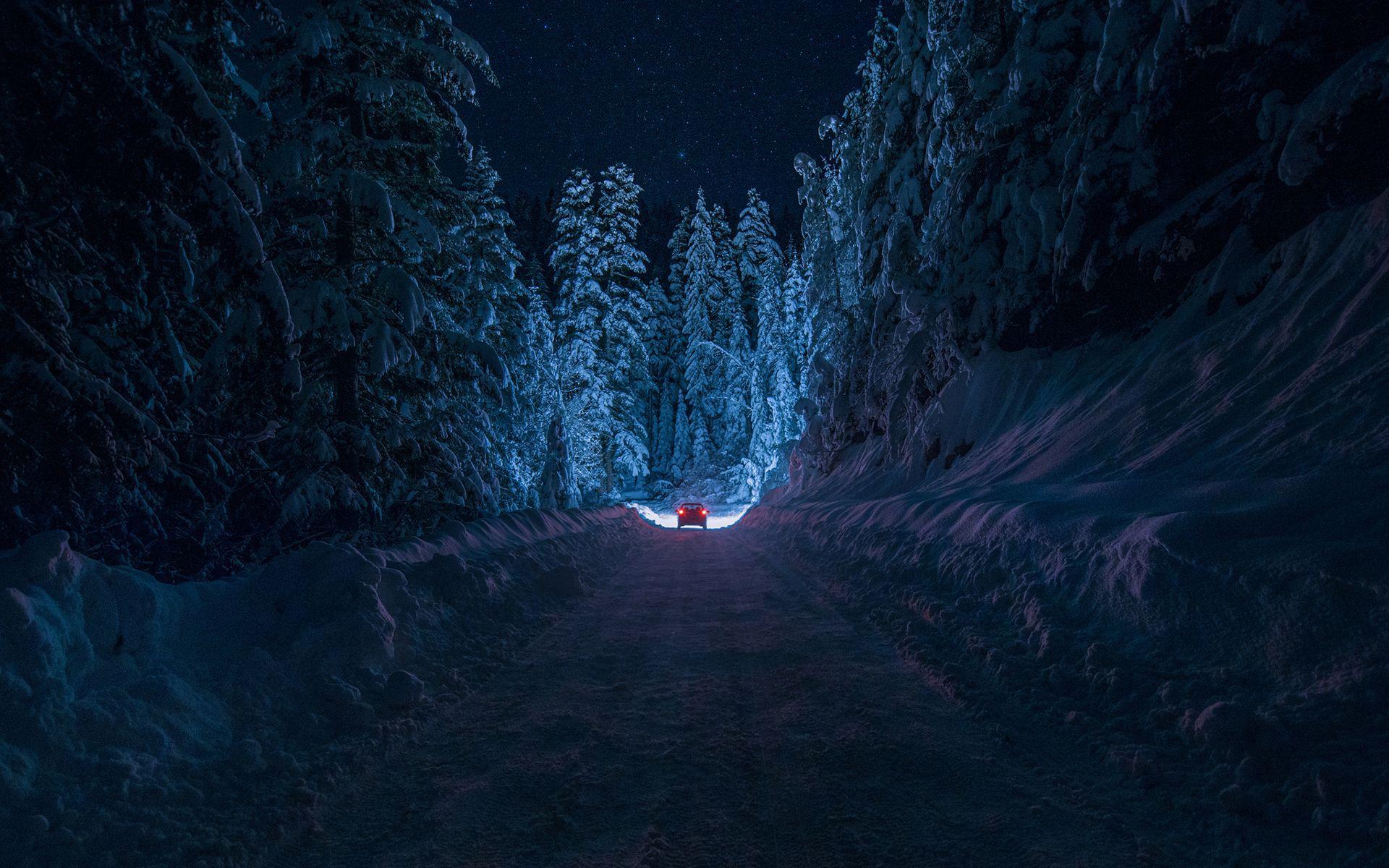 Free download wallpaper Winter, Night, Snow, Road, Forest, Tree, Car, Man Made on your PC desktop