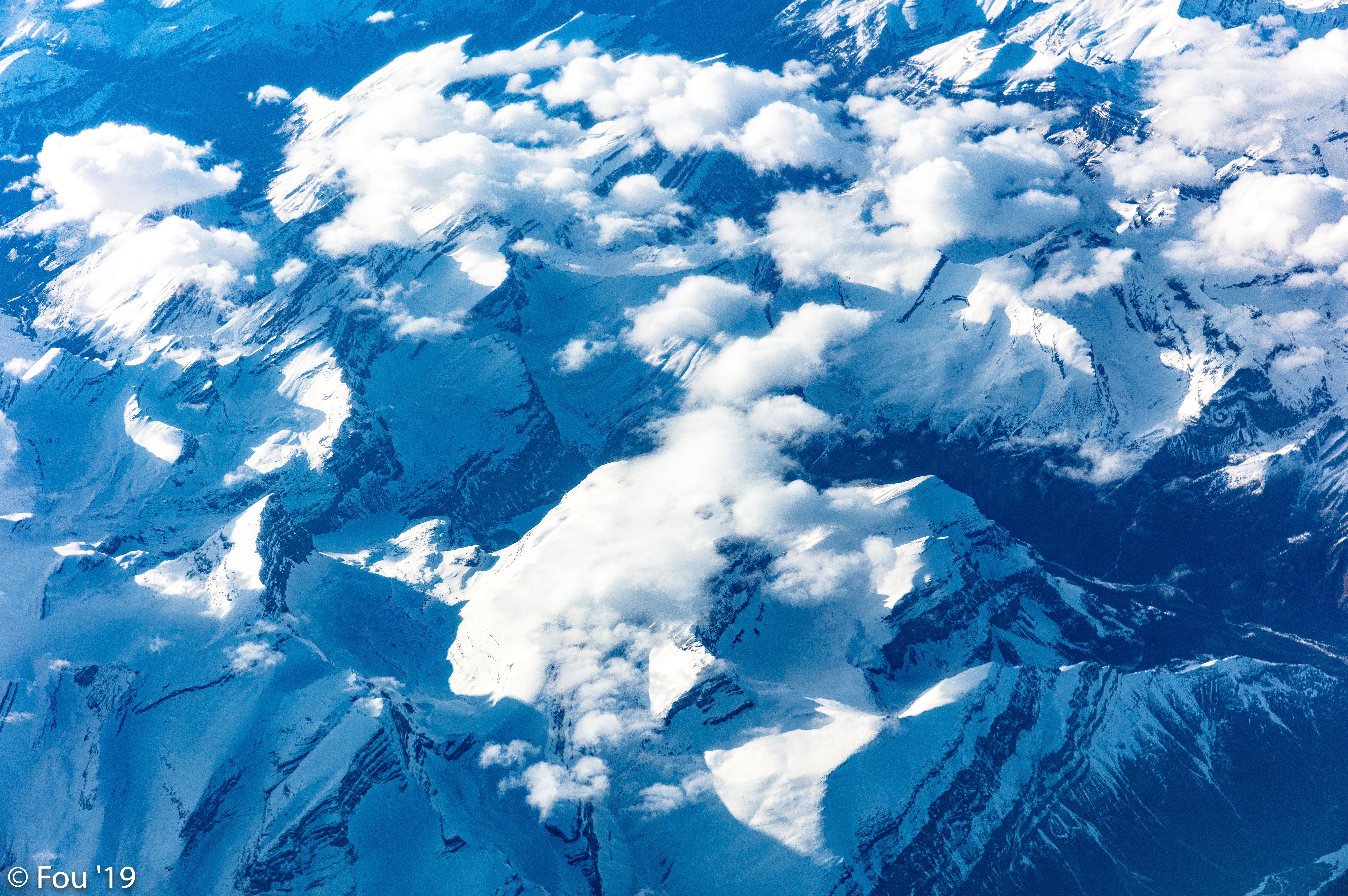 Free download wallpaper Nature, Mountains, Clouds, View From Above, Vertex, Snow Covered, Snowbound, Tops on your PC desktop