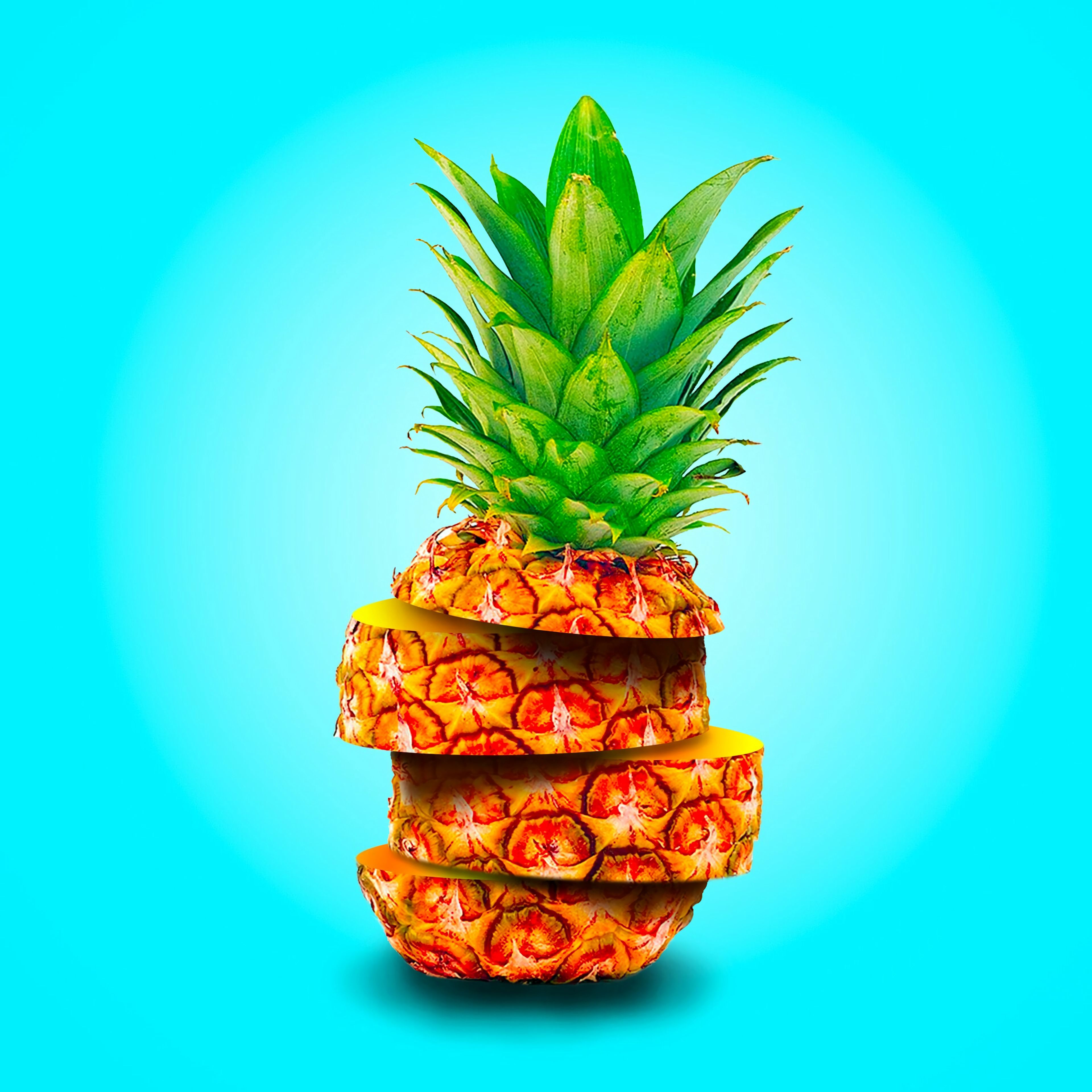 136203 скачать картинку ананас, фрукт, еда, дольки, экзотический - обои и заставки бесплатно