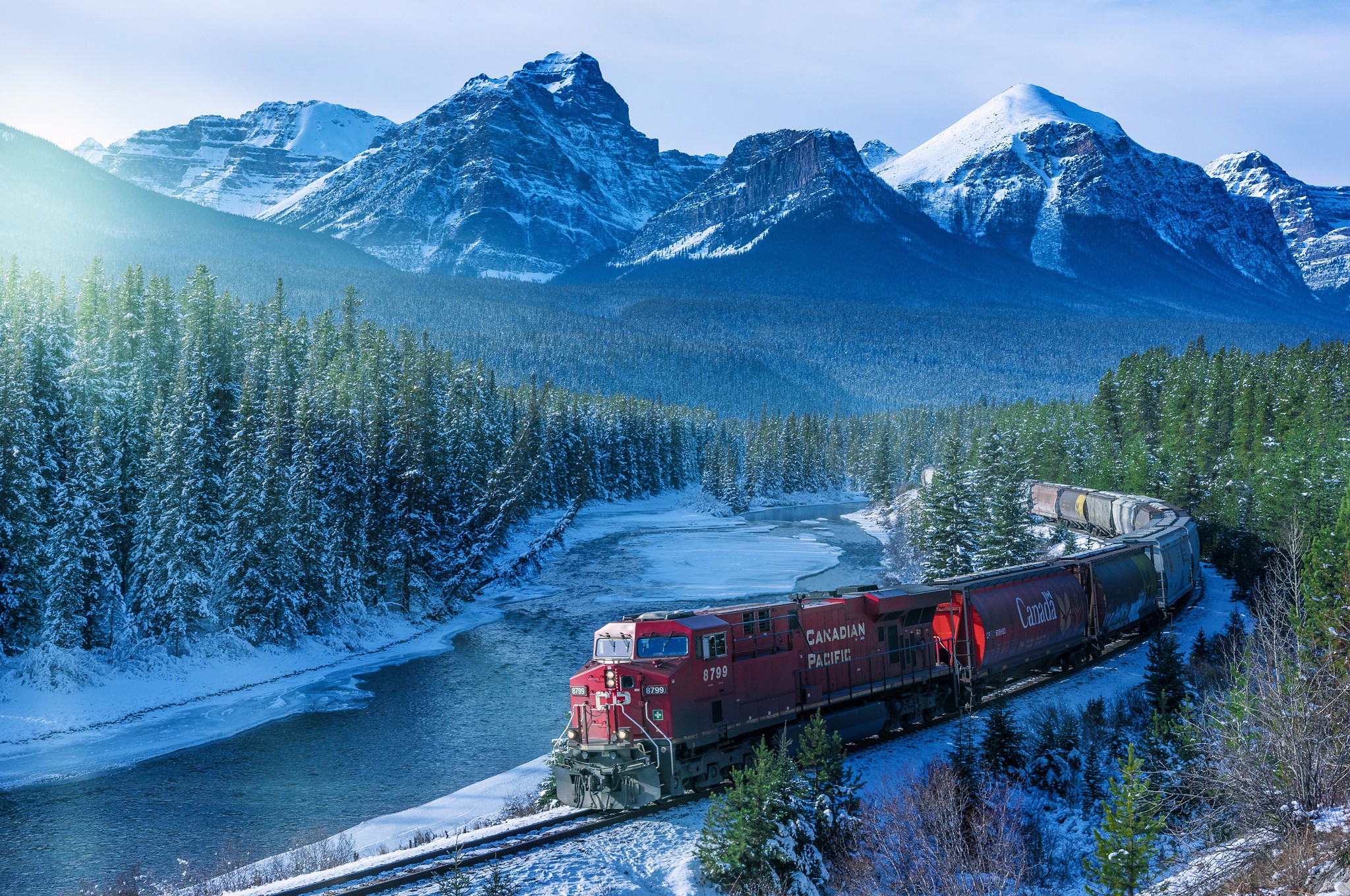 Download mobile wallpaper Landscape, Winter, Snow, Mountain, Forest, River, Train, Vehicles for free.