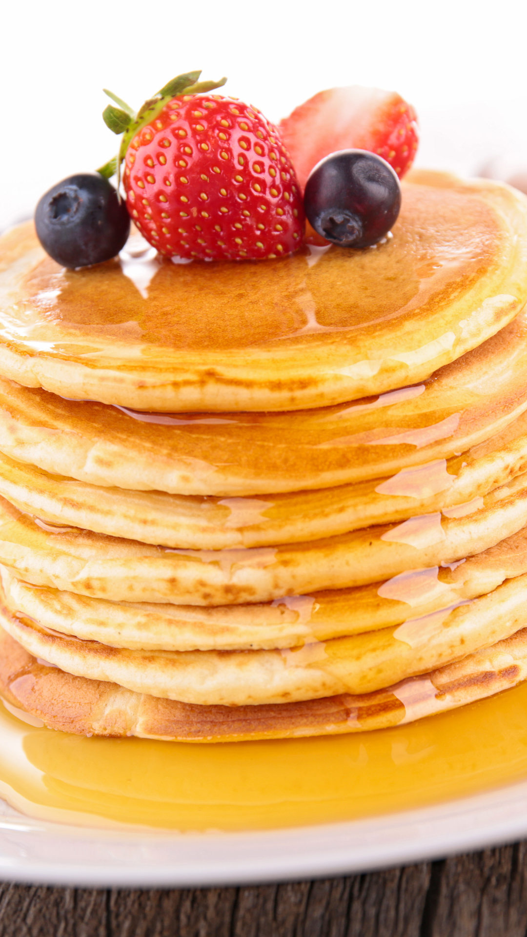 Download mobile wallpaper Food, Strawberry, Blueberry, Berry, Honey, Breakfast, Pancake for free.