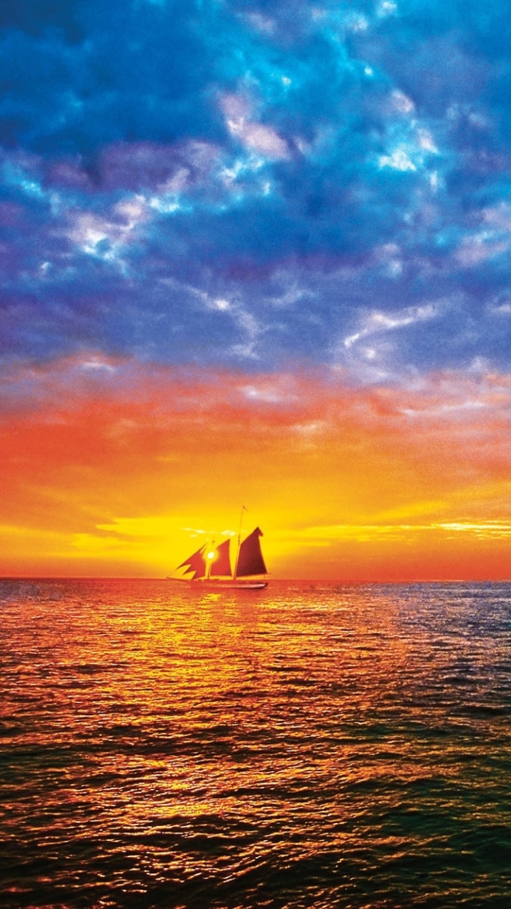 Download mobile wallpaper Sunset, Sea, Horizon, Ocean, Sailboat, Ship, Cloud, Vehicle, Vehicles, Sailing Ship for free.