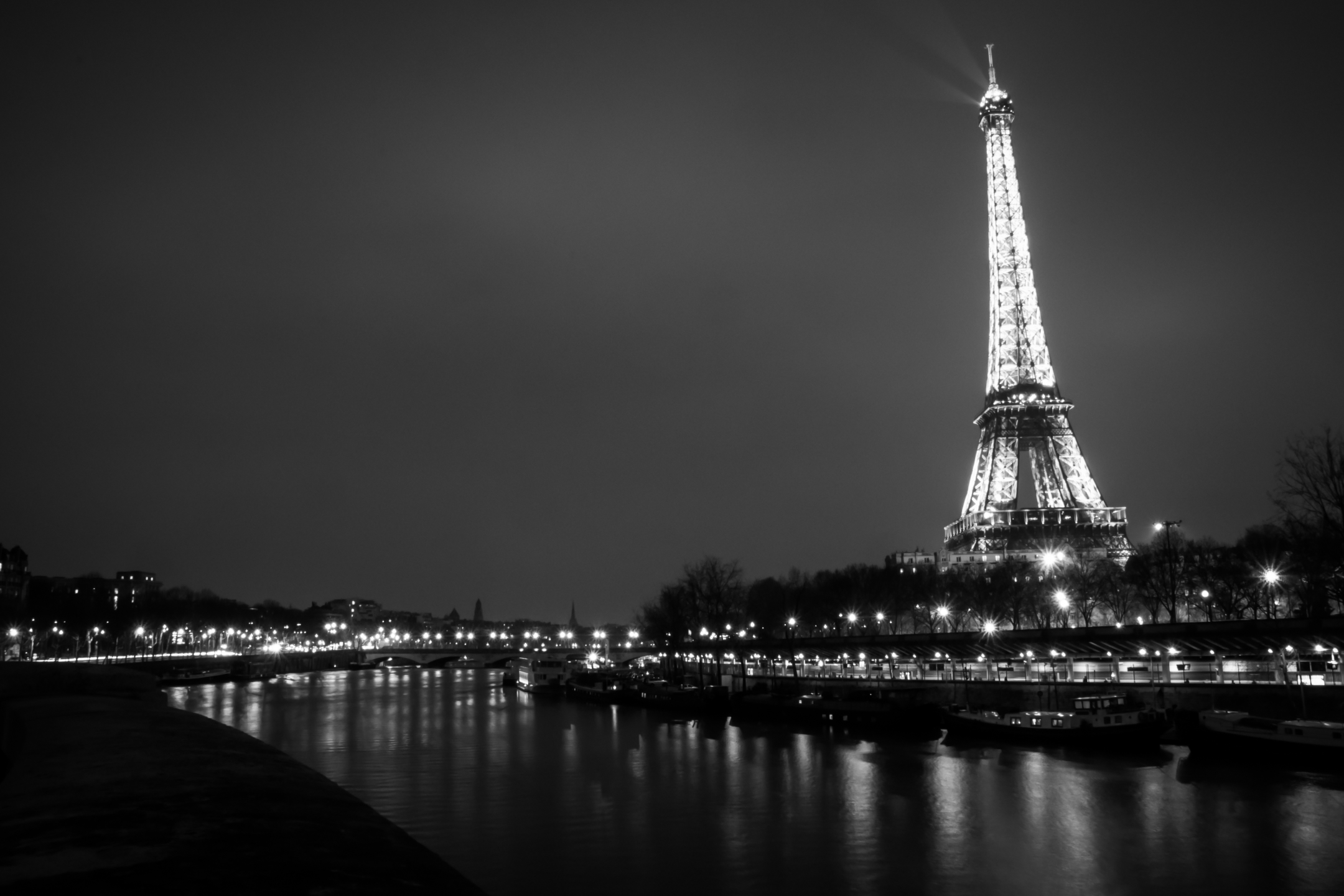 Free download wallpaper Cities, Night, Paris, Eiffel Tower, Light, France, River, Man Made, Black & White on your PC desktop