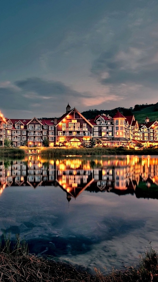 Download mobile wallpaper Lake, Reflection, Canada, House, Hotel, Man Made for free.