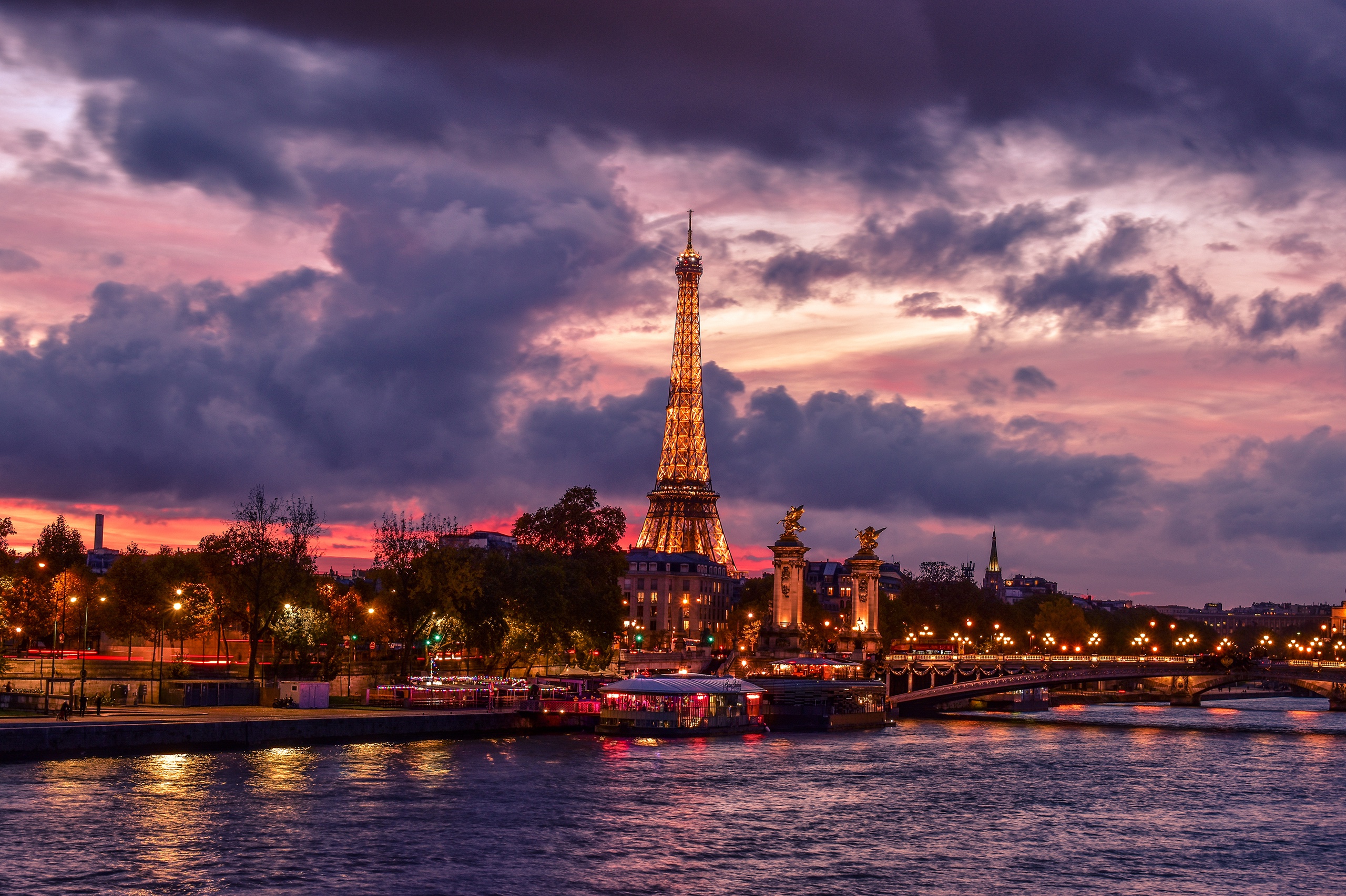 Download mobile wallpaper Night, Paris, Eiffel Tower, Monuments, France, Cloud, River, Monument, Man Made for free.