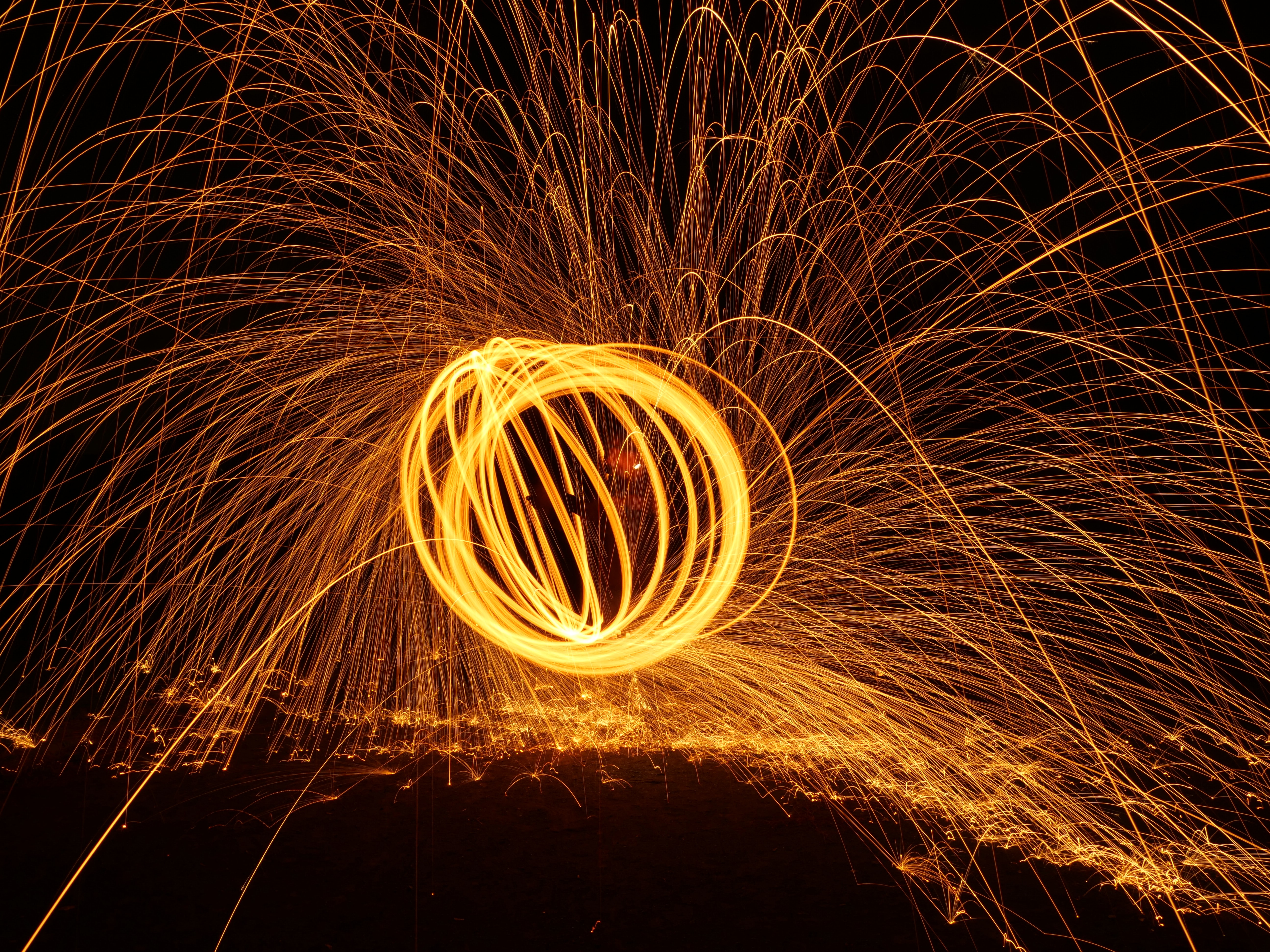 Download mobile wallpaper Freezelight, Sparks, Glow, Night, Circle, Dark for free.