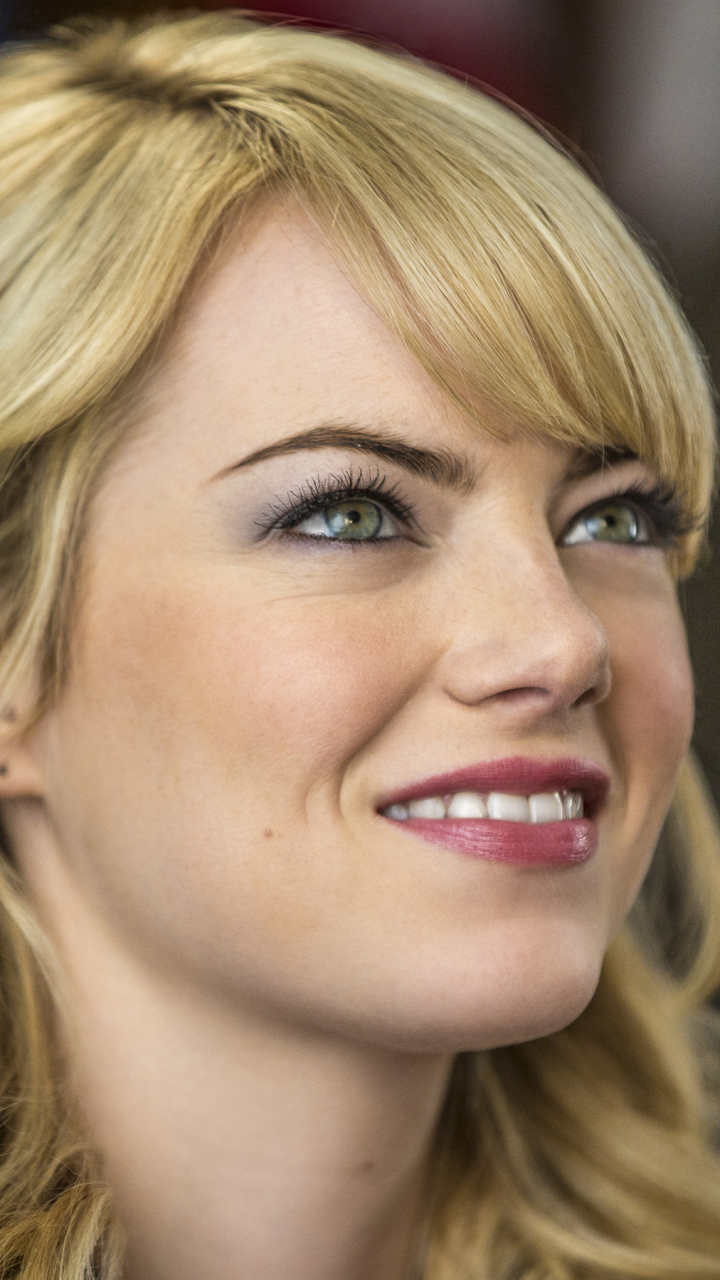 Download mobile wallpaper Emma Stone, Smile, Blonde, Face, Blue Eyes, American, Celebrity, Actress for free.