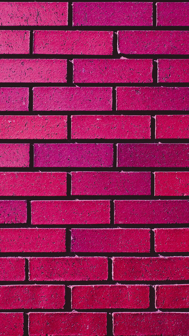 Download mobile wallpaper Pink, Wall, Brick, Man Made for free.