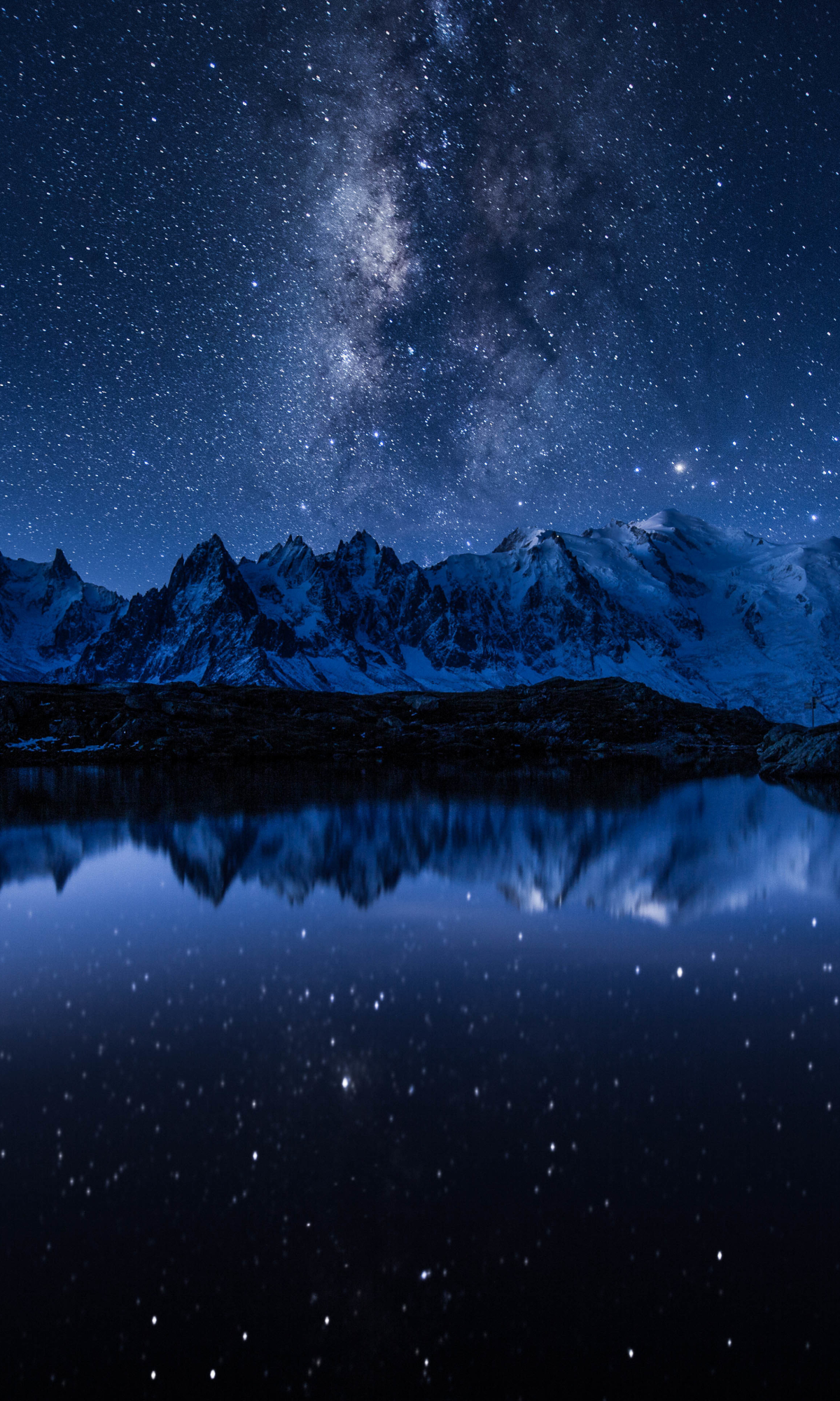 Download mobile wallpaper Nature, Water, Sky, Stars, Night, Mountain, Reflection, Earth, Milky Way for free.