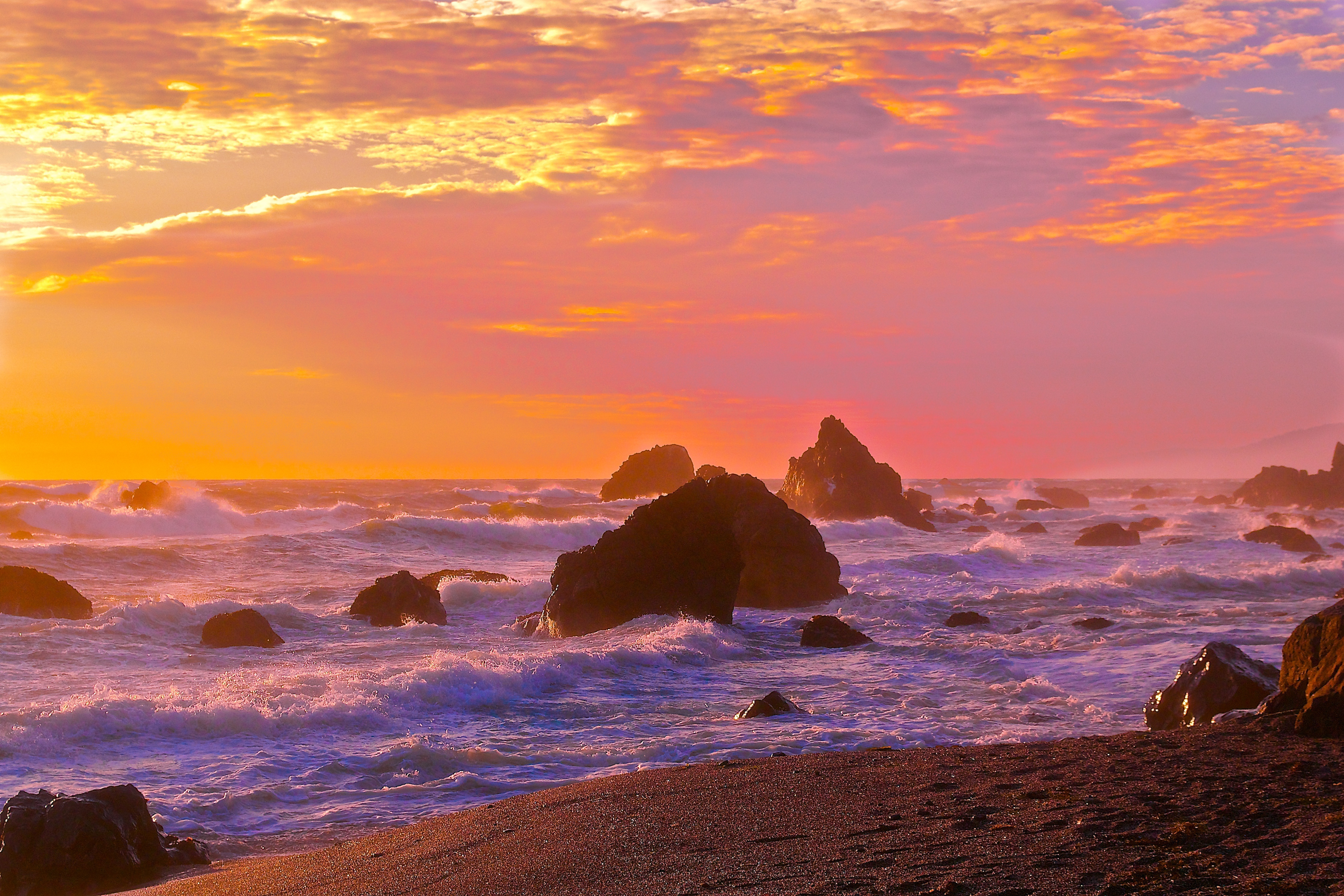 Download mobile wallpaper Sunset, Sky, Sea, Earth, Glow, Cloud, Wave, Seascape, Seashore for free.