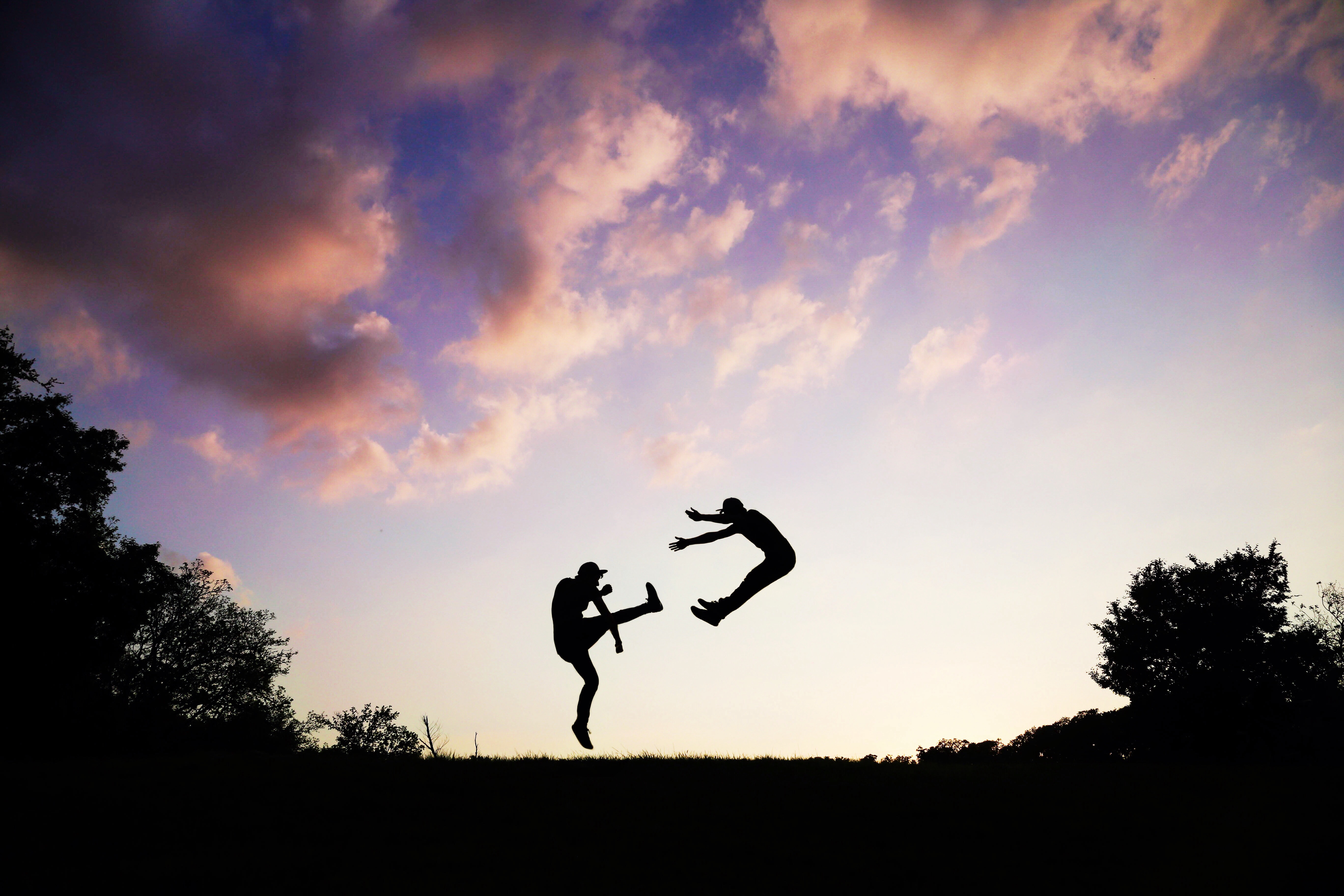 Download mobile wallpaper Bounce, Jump, Silhouette, Dark, People for free.